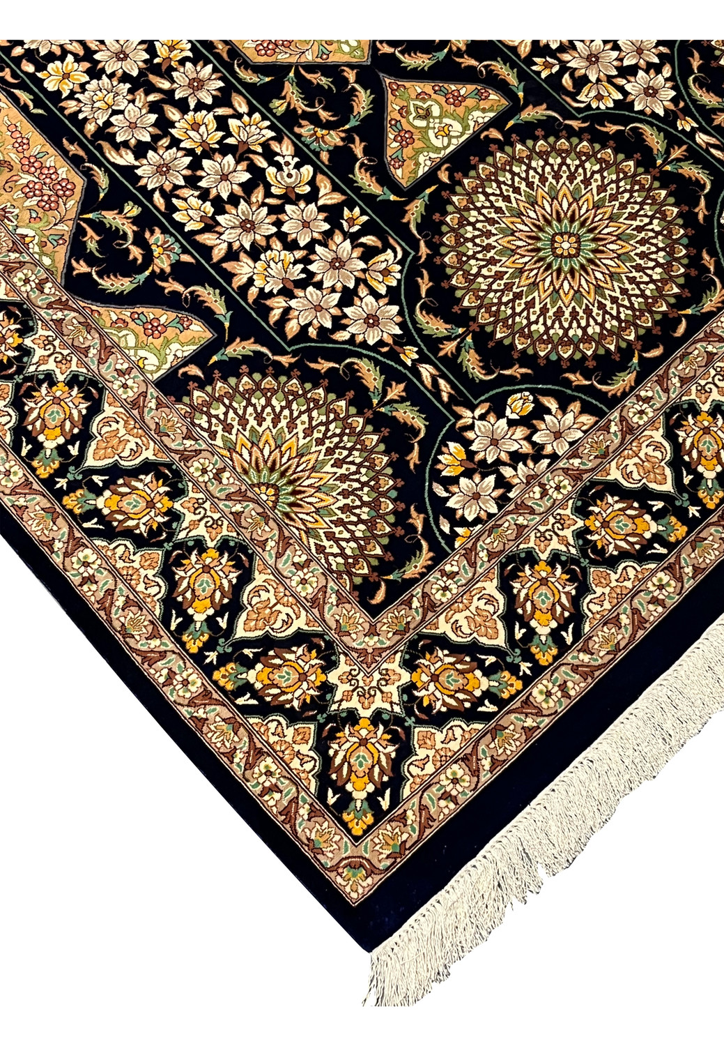Edge detail of Persian silk rug showing tight weave, clean selvedge finish and rich navy outer band with sharp floral border definition