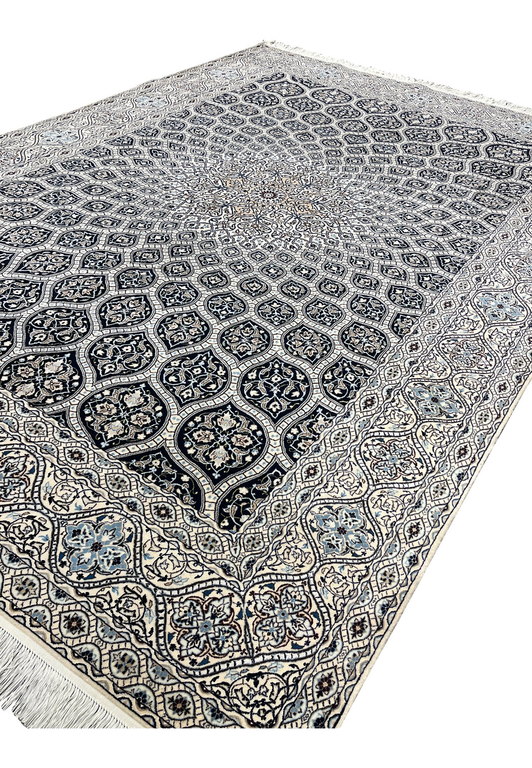 Angled view highlighting depth of navy cartouches and ivory field Persian Nain Habibian 6 LA silk accents.