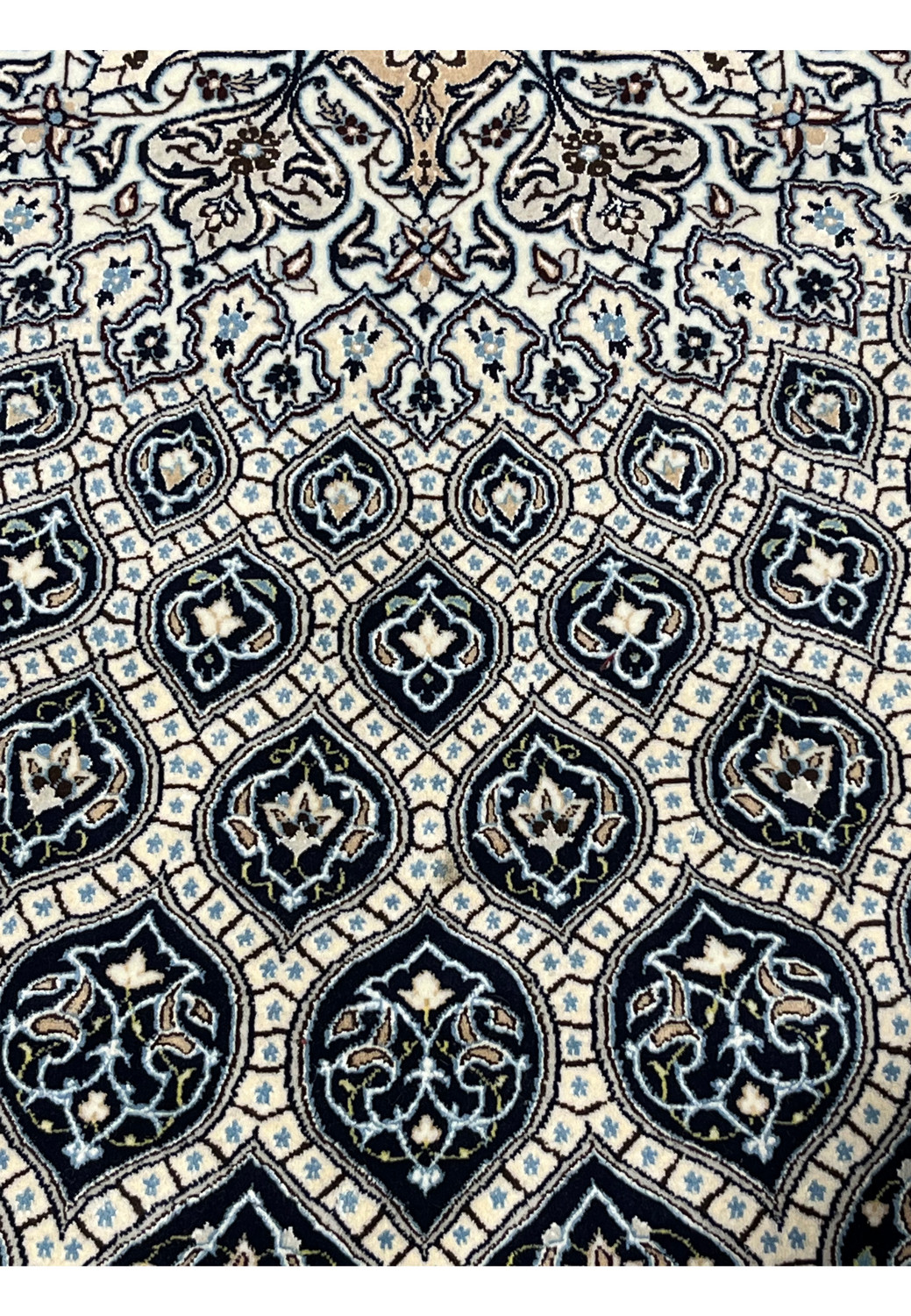 6'9 x 10 Persian Nain Habibian 6 LA rug showing ivory field with navy Gombadi dome design and silk floral motifs hand knotted in Persia.