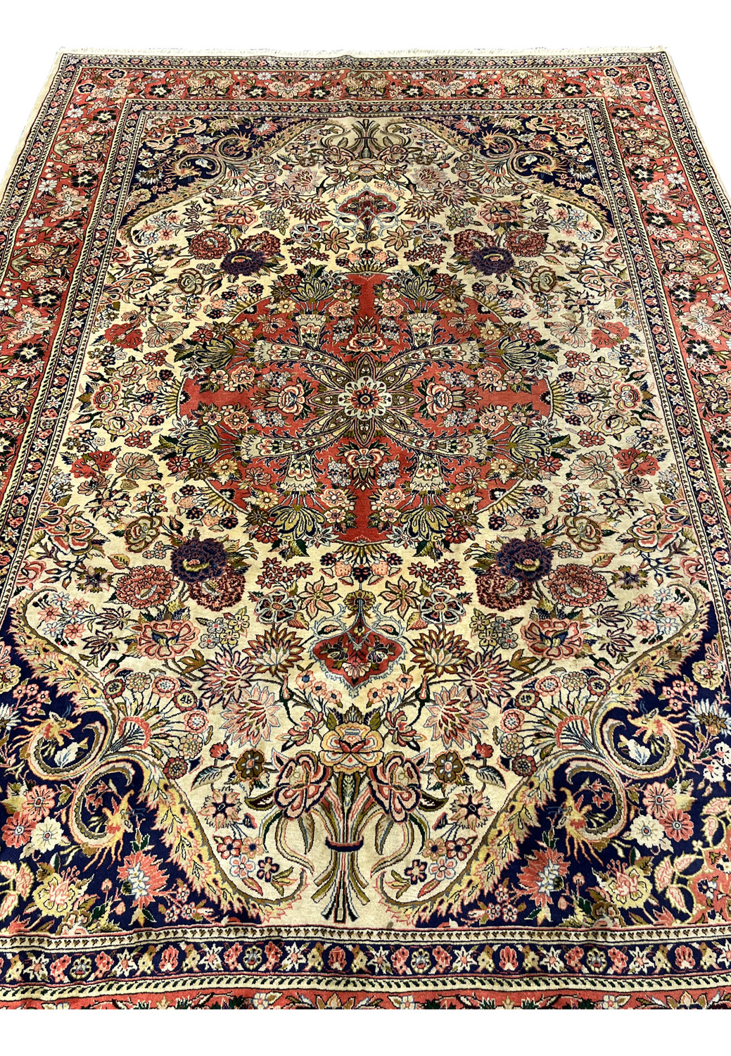 Midfield detail of Persian Bijar rug with intricate floral sprays ivory background and 500 KPSI tight knot structure