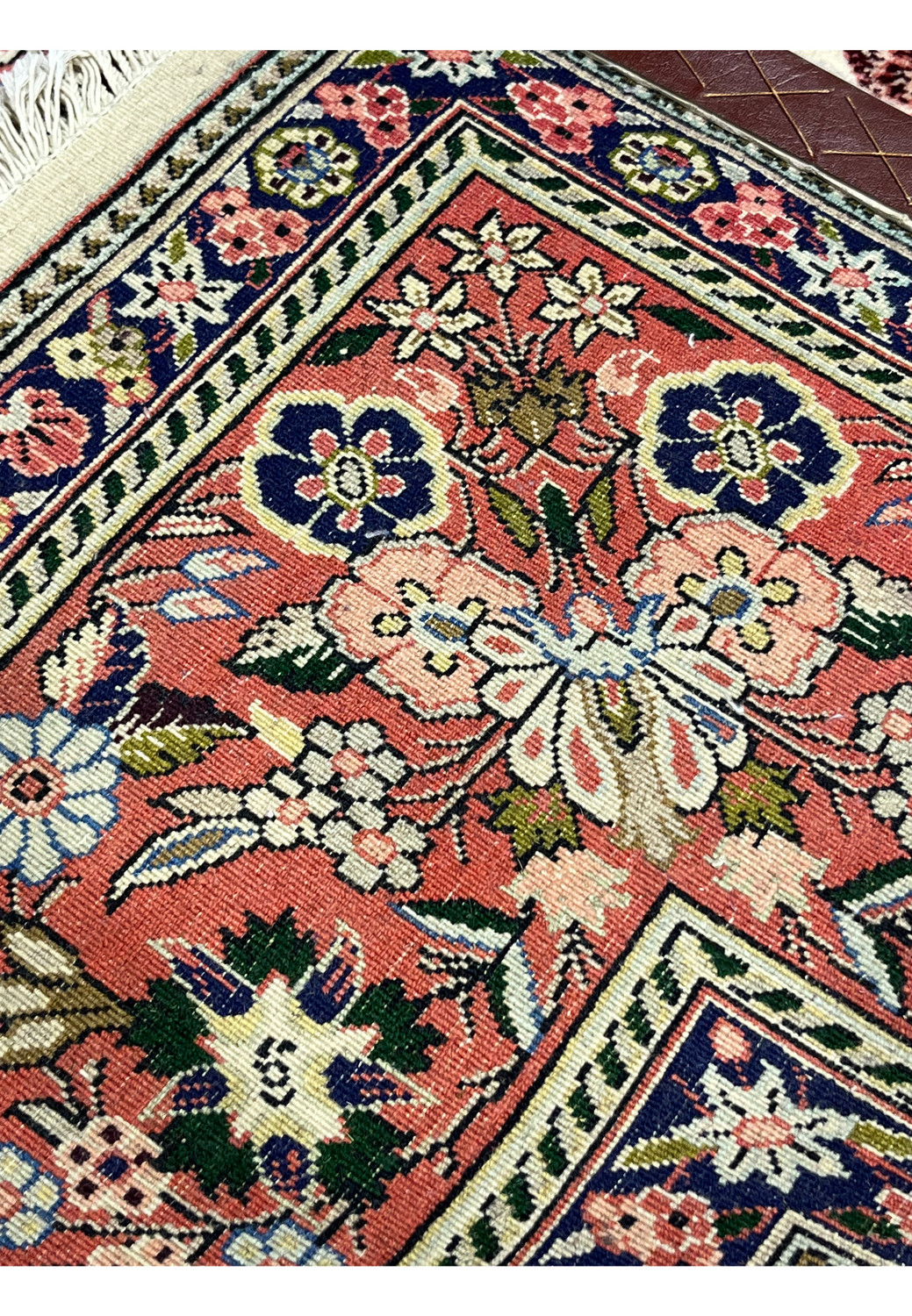 Backside of Persian Bijar rug revealing fine knot work structured foundation and high density craftsmanship
