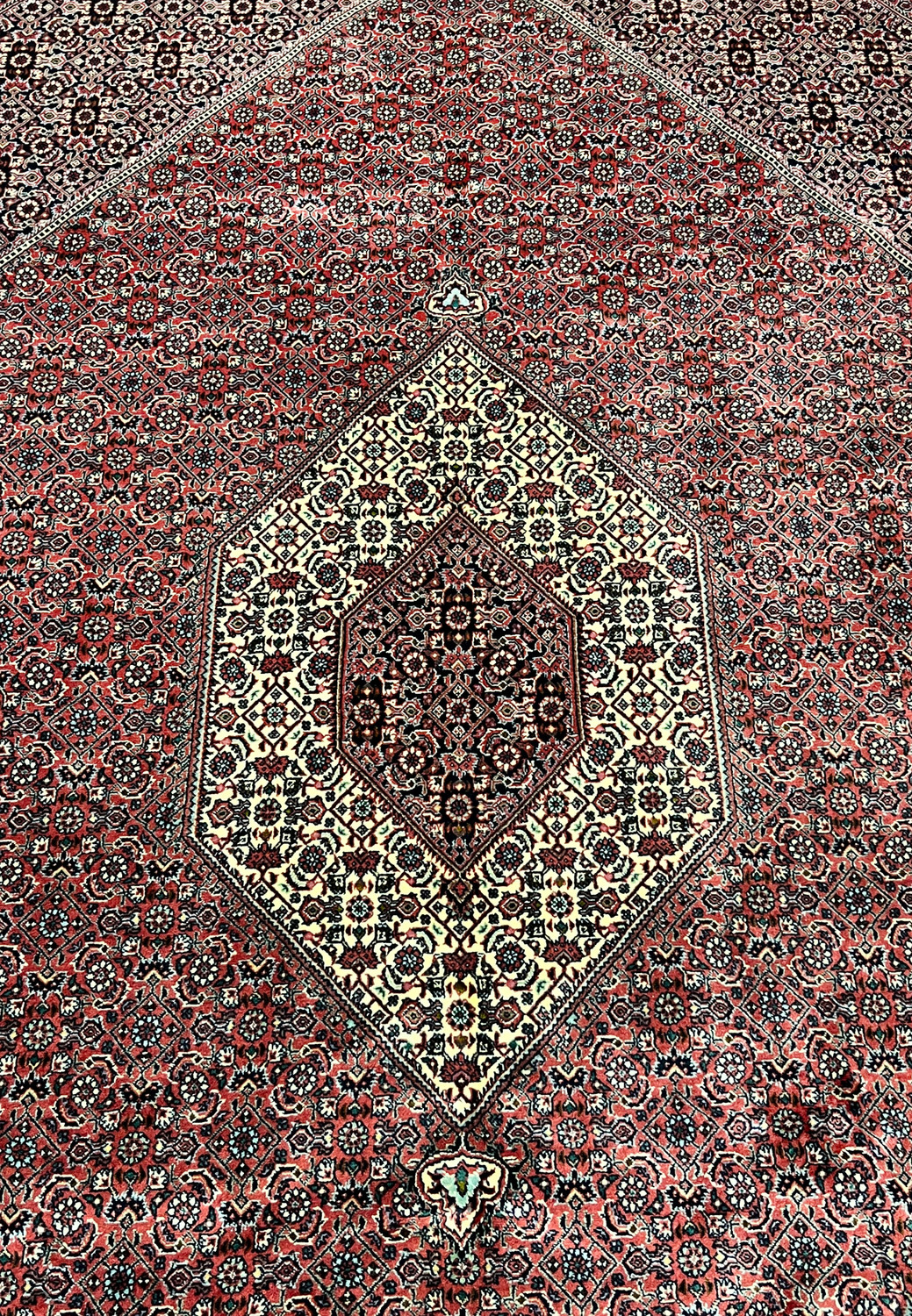 Close up diamond medallion of 8'2 x 11'4 Persian Bijar Iron Rug in deep red and ivory with dense Herati pattern and fine wool detail
