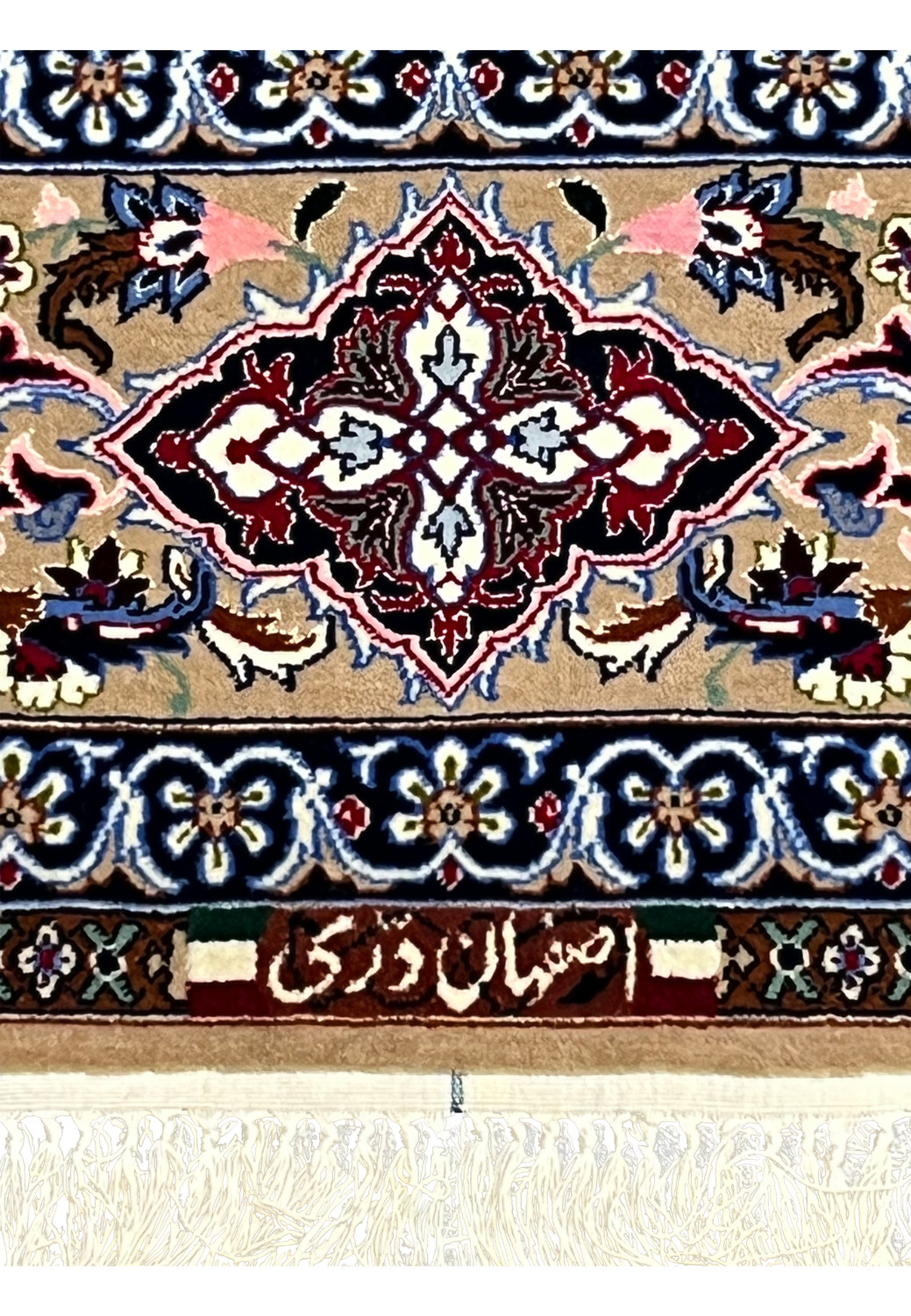 Zoomed Darri weaver signature Persian Isfahan rug woven in Persian script navy border authentication mark