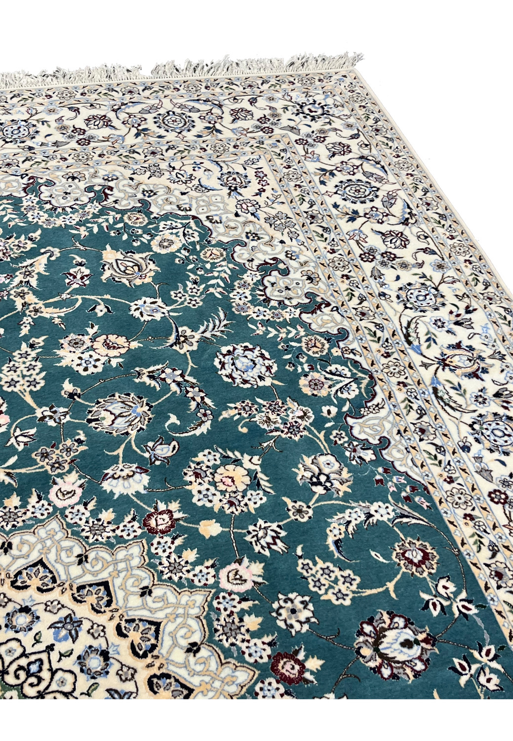 Upper border detail of 7x10 Persian Nain 6La Habibian rug with ivory floral vine on teal