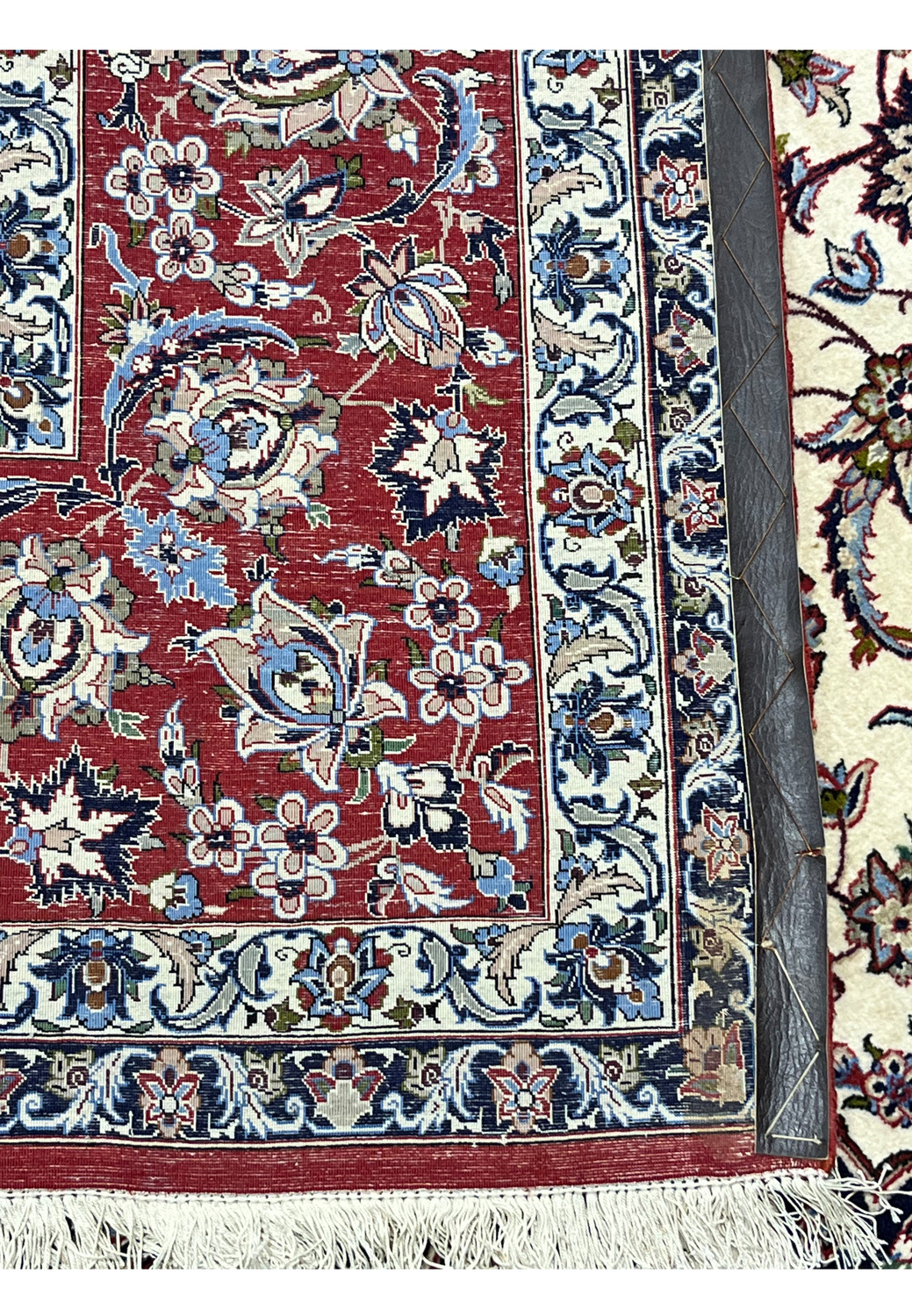 Backside 8x12 premium Persian Isfahan wool silk rug hand knotted cotton foundation crisp floral pattern visible through weave