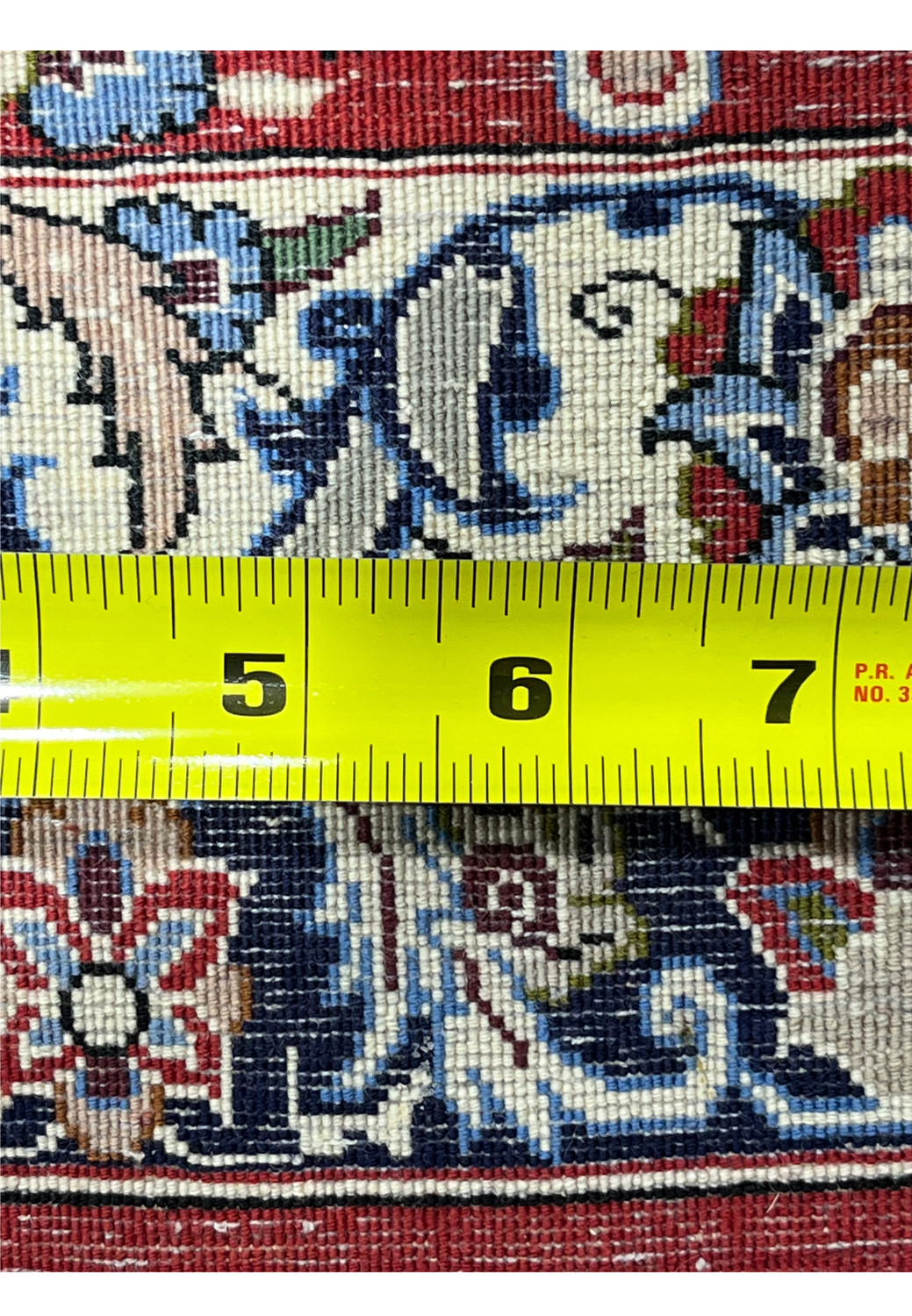 Backside with ruler 8x12 premium Persian Isfahan wool silk rug measuring fine knot density hand knotted cotton foundation