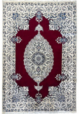 Full view of the 6'8 x 10'4 Persian Nain 9LAA Wool & Silk Rug, displaying the central medallion and surrounding floral patterns.