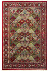 Hand-knotted 6'8 x 10 Persian Qum rug with intricate floral and geometric patterns, featuring rich red, beige, green, and blue colors