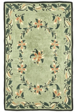 6x9 hand-hooked Oriental rug with scrolling floral vines on a soft sage green field