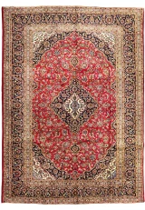 10x13 vintage Persian Kashan rug, deep red field with a navy medallion and ornate floral border.