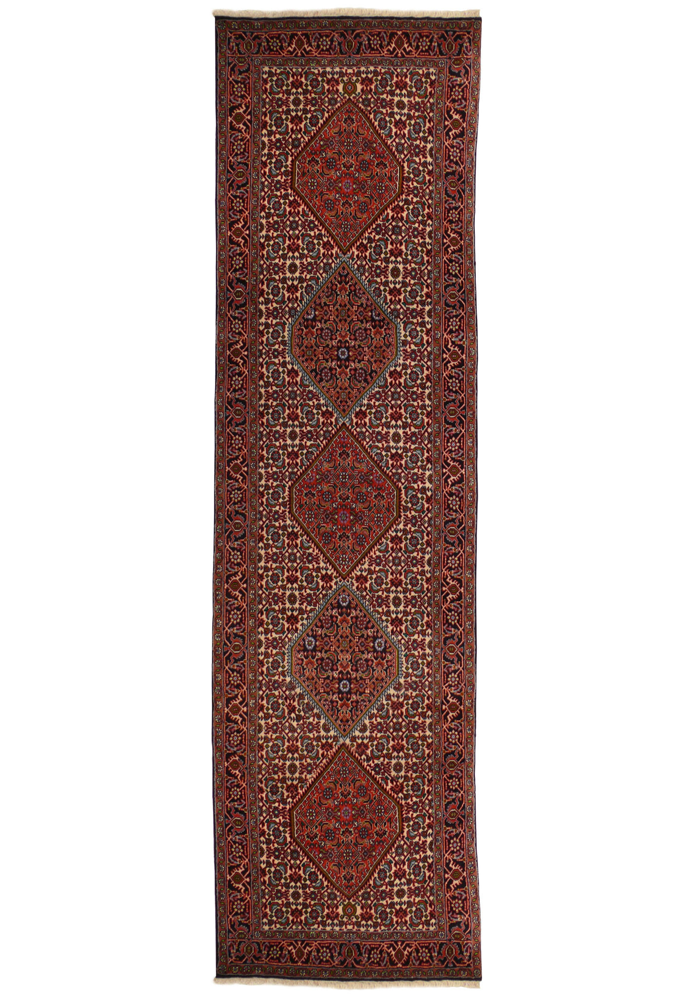Antique Persian Bijar Runner Rug with deep reds and intricate geometric patterns displayed against a cream background, full view