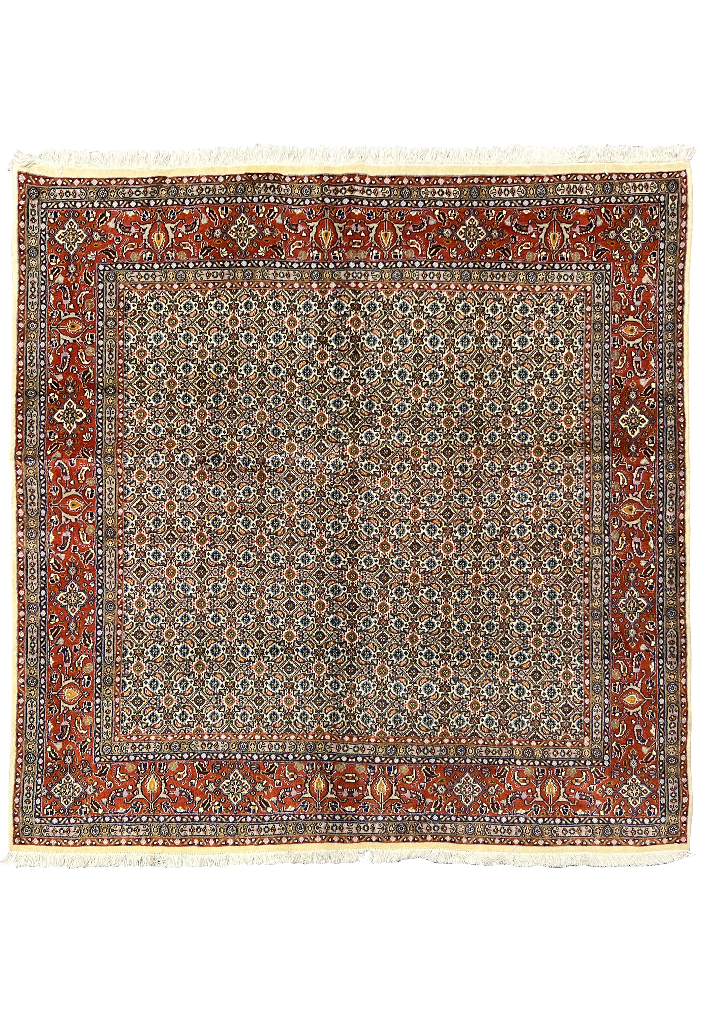 Full square view of 7x7 Persian Moud rug with all-over Herati design in rust, ivory, and navy.
