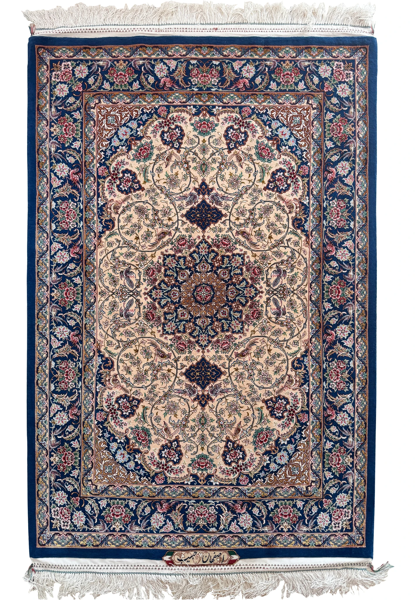 3'5" x 5' Persian Isfahan signed Habib, navy star medallion on ivory inside a navy border, overhead view