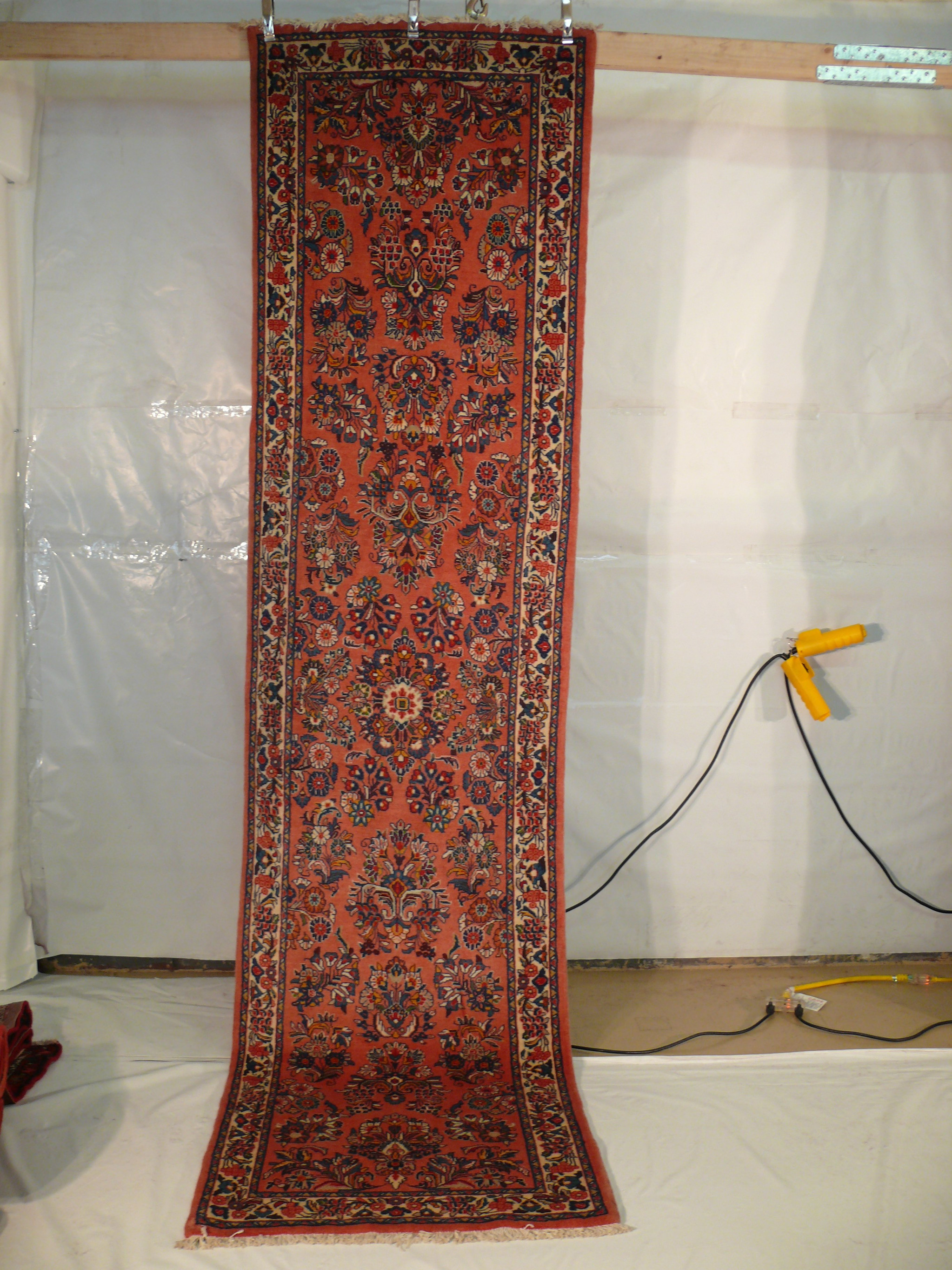 Same picture of this Sarough 3x11 Persian Runner hanging