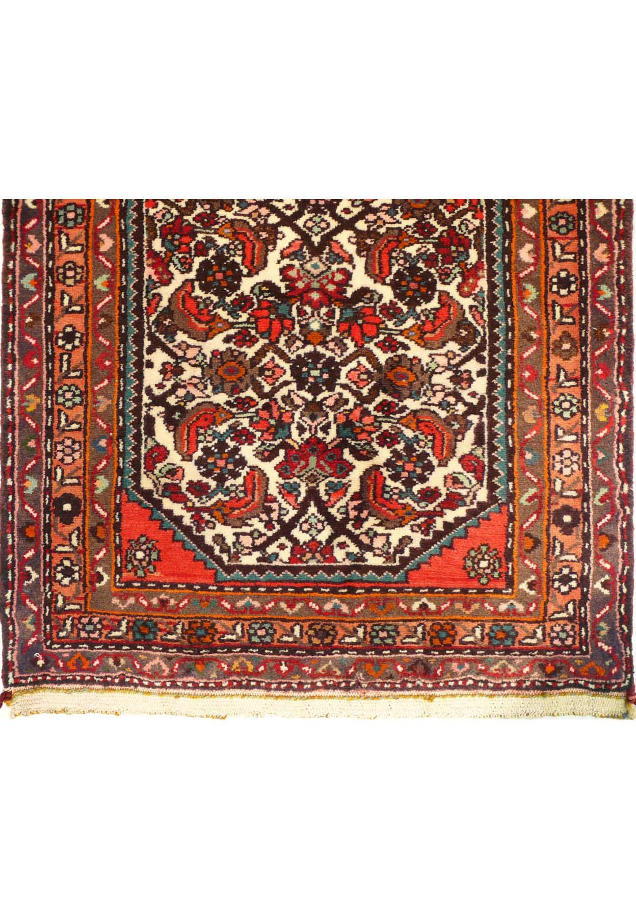 Detail of the rug’s edge, highlighting the craftsmanship of the handwoven wool.