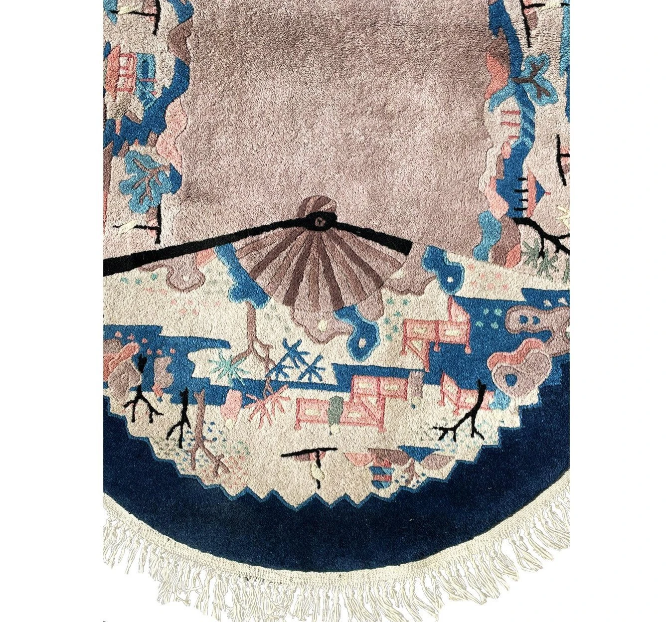 Border of a 2'3" x 5'5" Oriental Art Deco Oval Rug