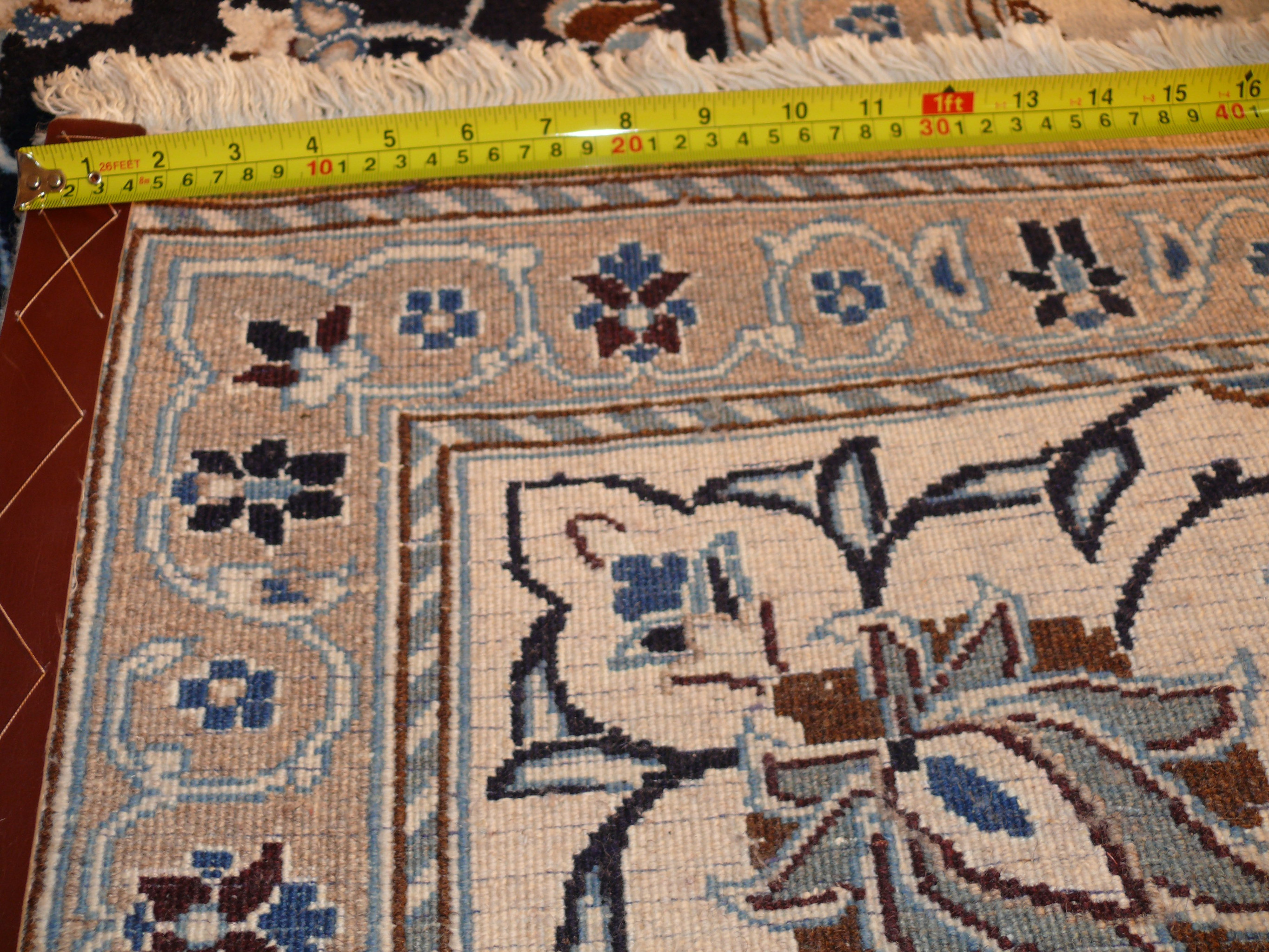 Back view of the 8'1 x 11'3 Persian Nain rug showing the hand-knotted structure