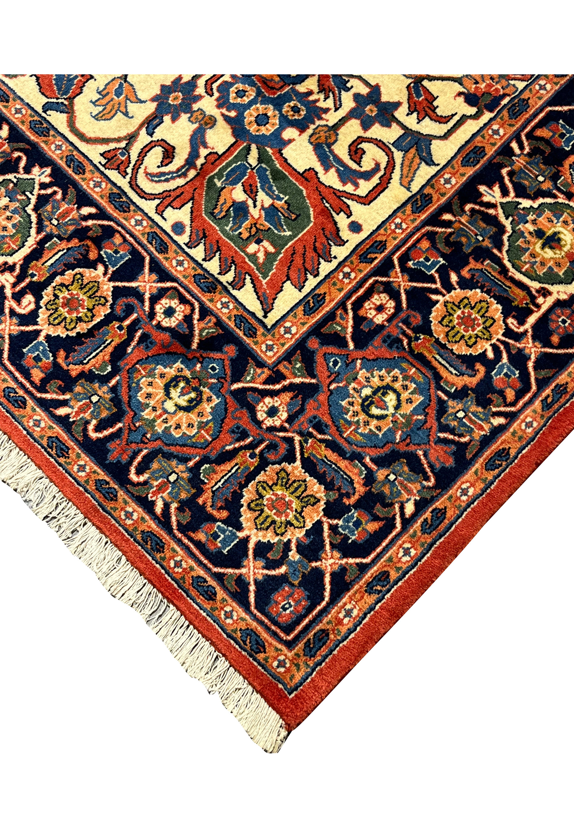 Edge and fringe detail of a hand knotted Persian Heriz rug showing clean finishing and strong wool structure