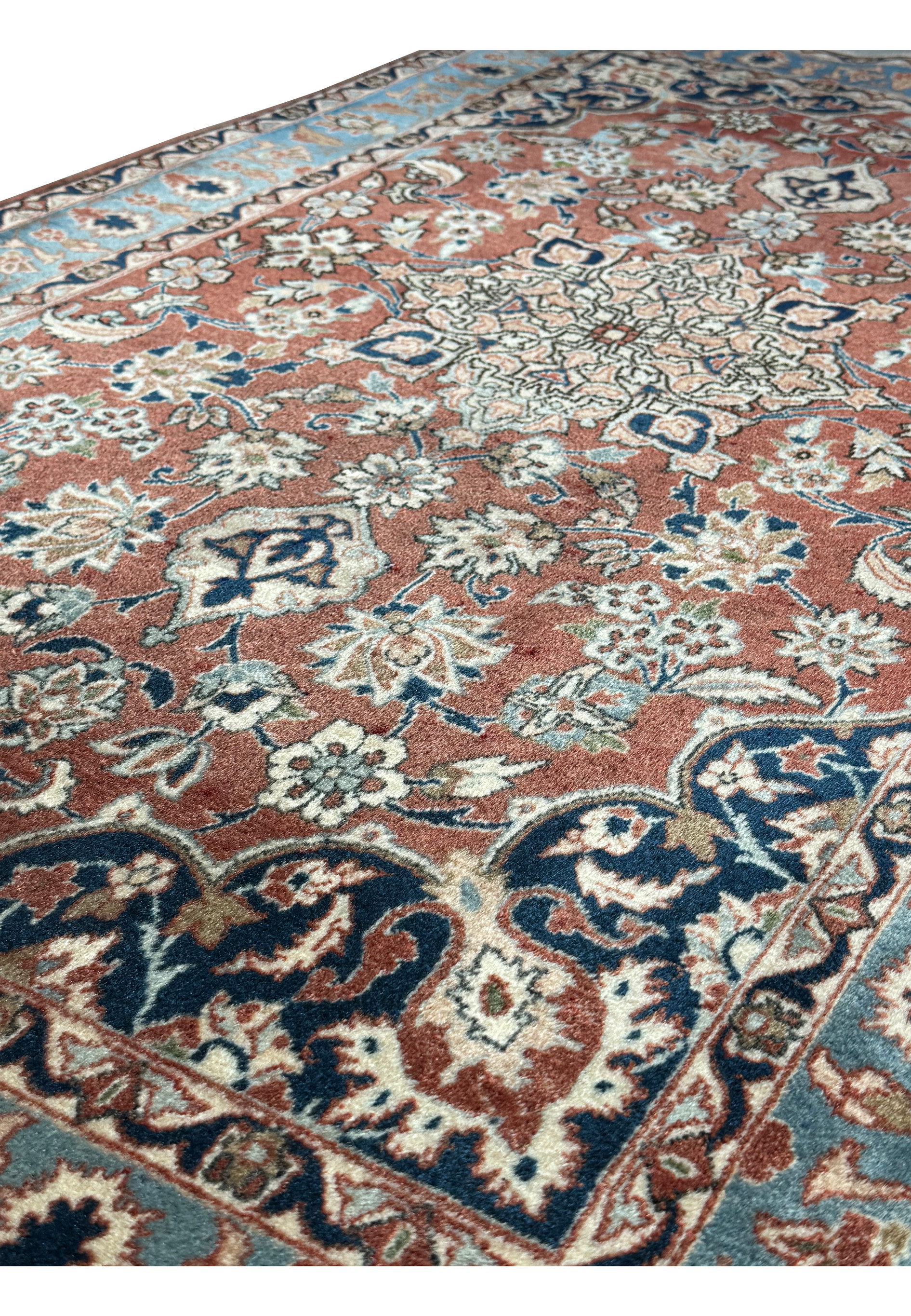 Edge detail of a 3x5 Antique Mashad Rug, showing the fine weaving and clean finishing of the fringe A