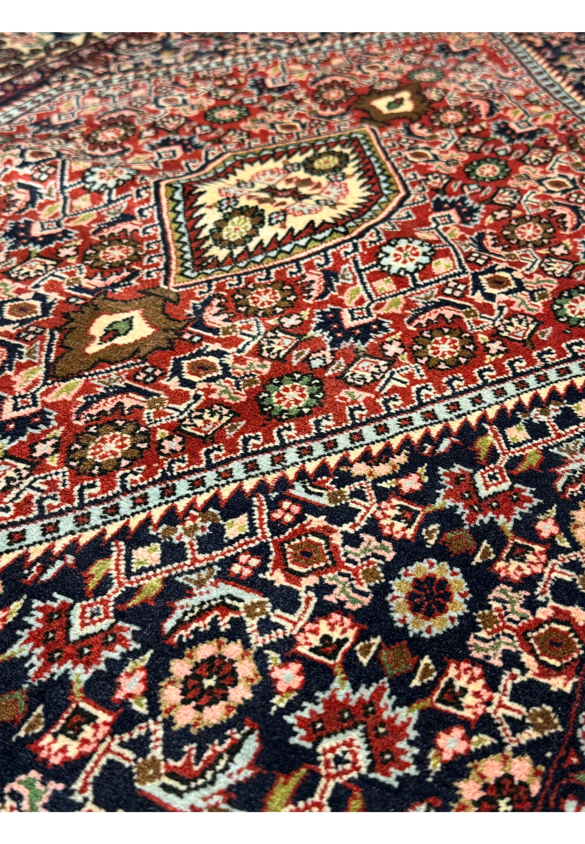 Admire the heritage! This Bijar rug's traditional design, seen in its 3x5 dimensions, harmonizes classic Persian motifs with timeless allure.