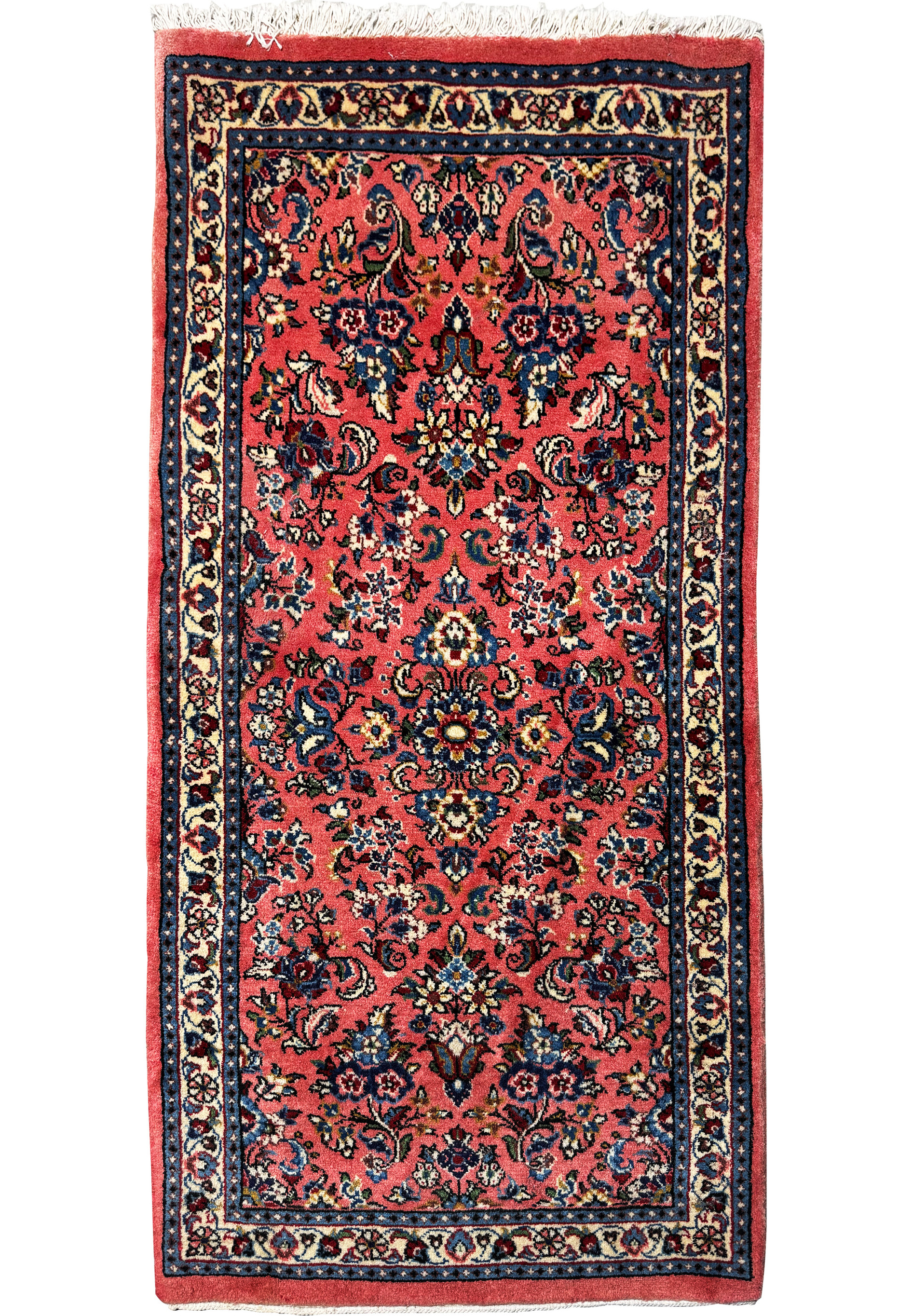 Elegant 2'2 x 4'4 Persian Sarough rug with intricate floral patterns in rich shades of red, navy blue, and cream against a warm red background, showcasing the detailed craftsmanship