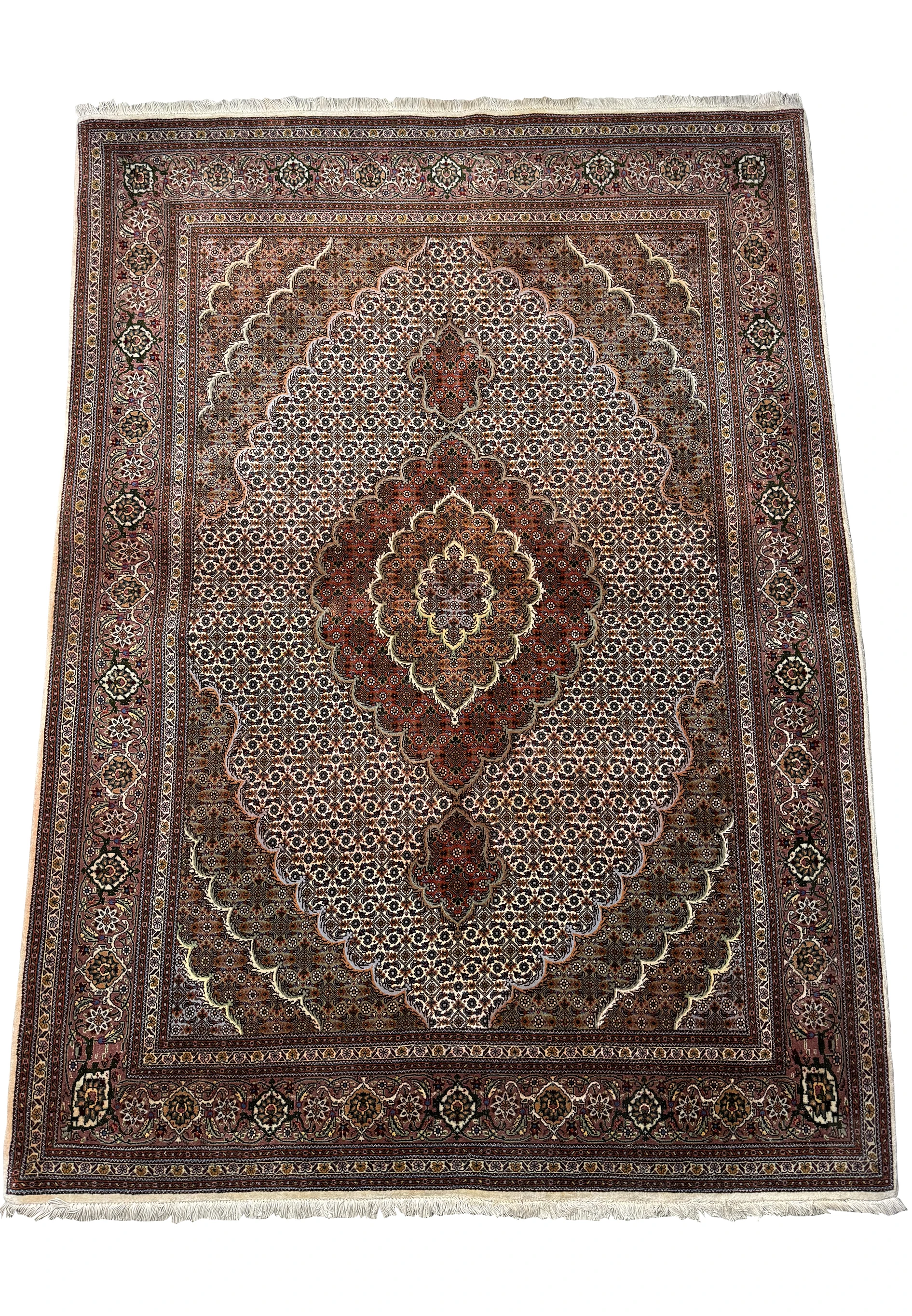 Full view of a 5x7 Persian Tabriz Mahi rug, illustrating the symmetry and balanced design of the central medallion, corner brackets, and comprehensive border pattern