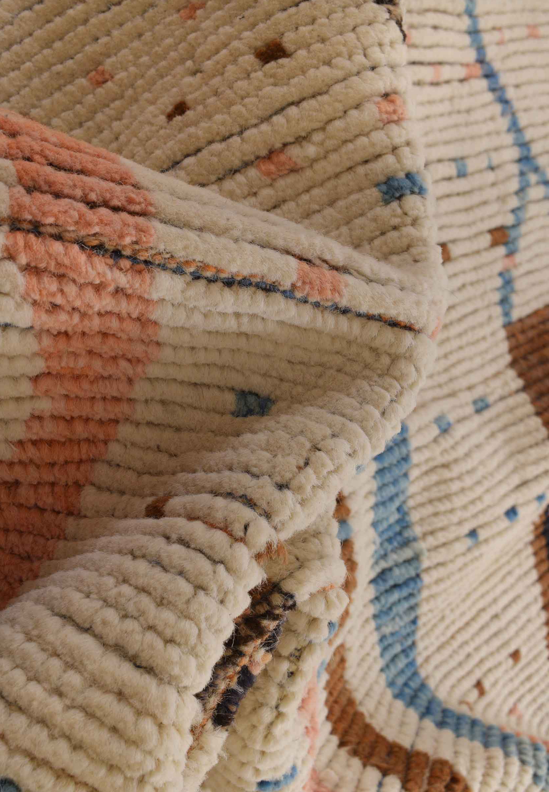 Folded 12x18 Moroccan Modern Rug made in Pakistan showing the fine weave.