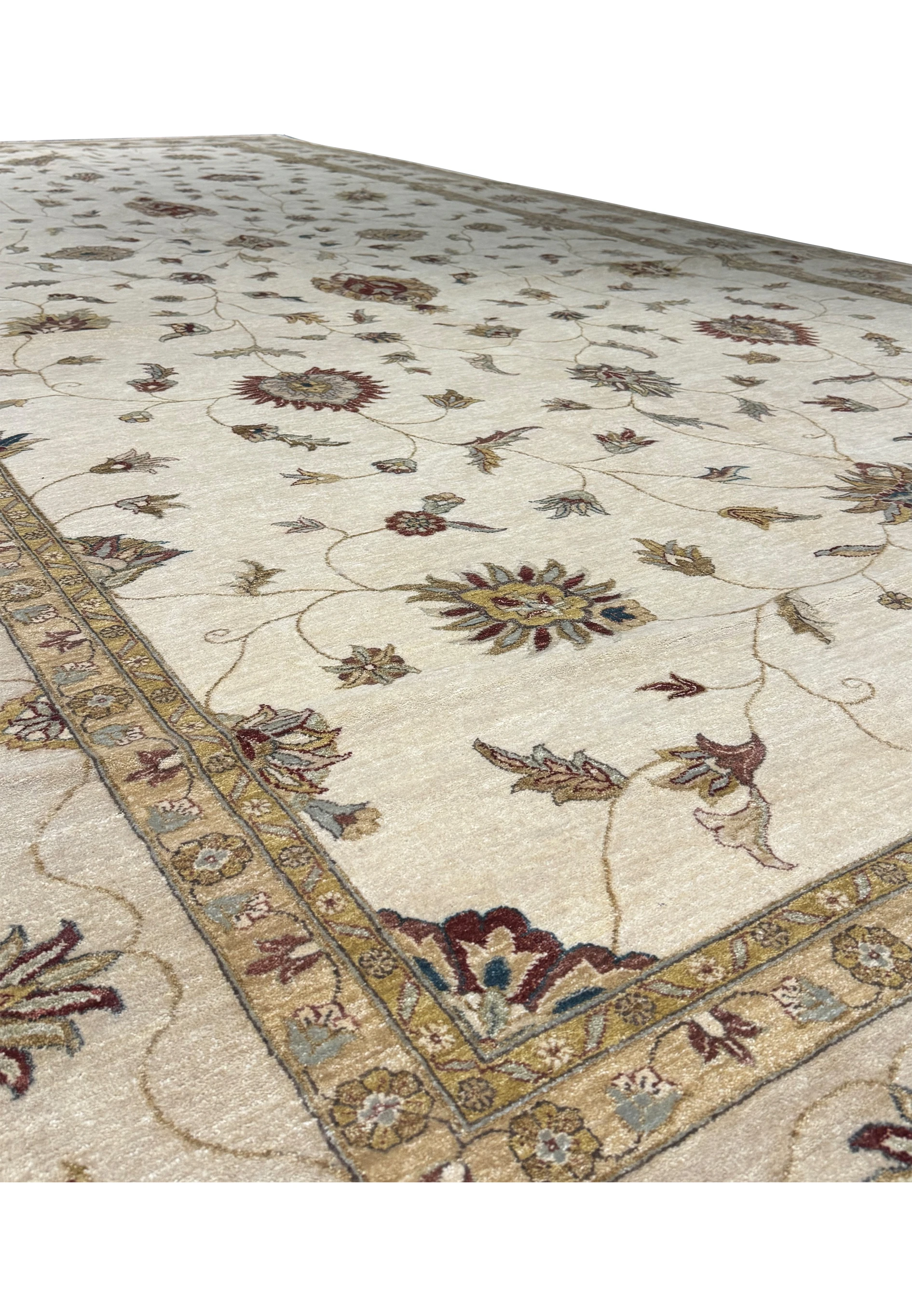 Close-up of the rug's intricate patterns and colors in natural lighting.