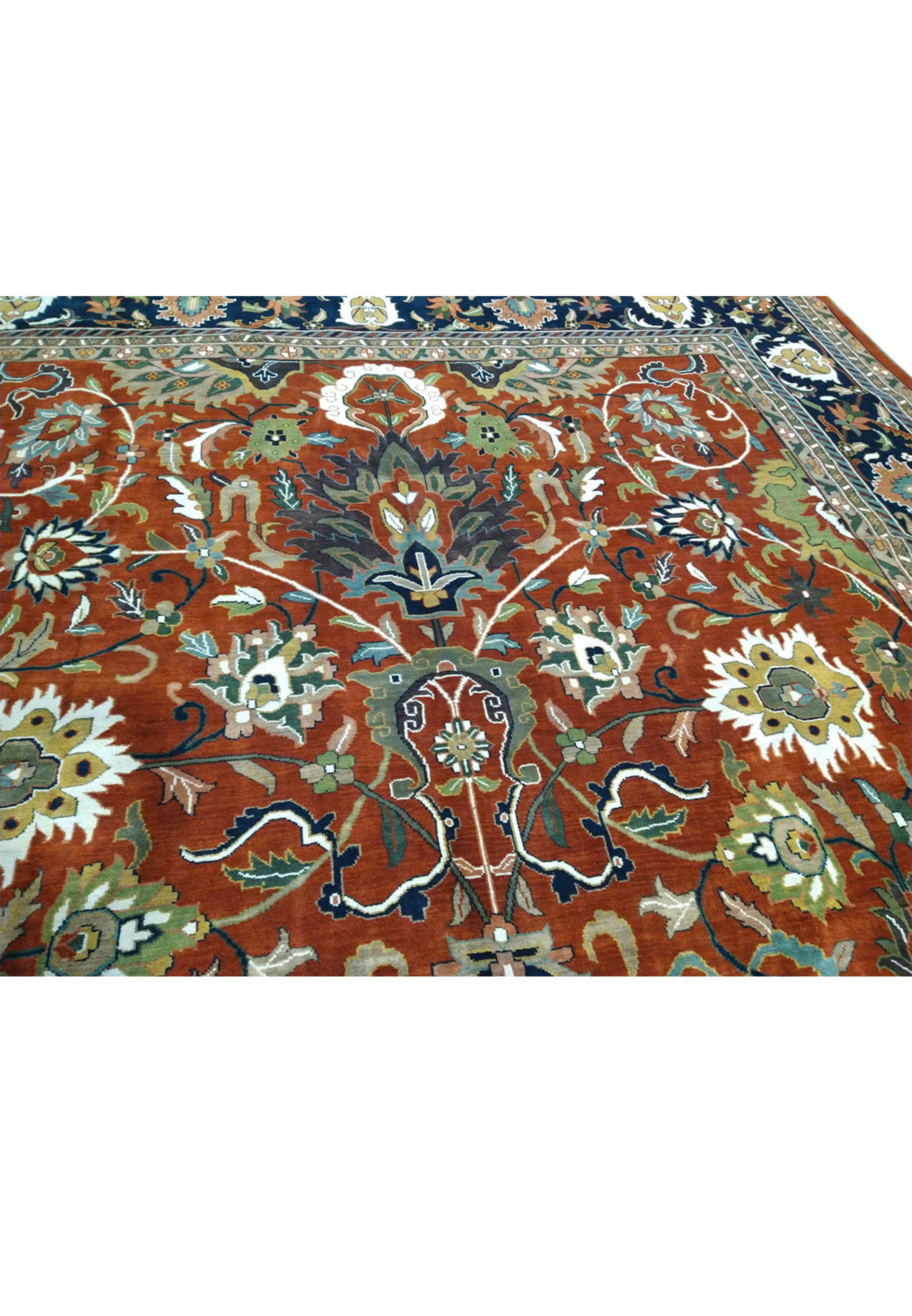 Perspective view of a luxurious handwoven Oriental Serapi Palace Rug laid out to display its full design and size