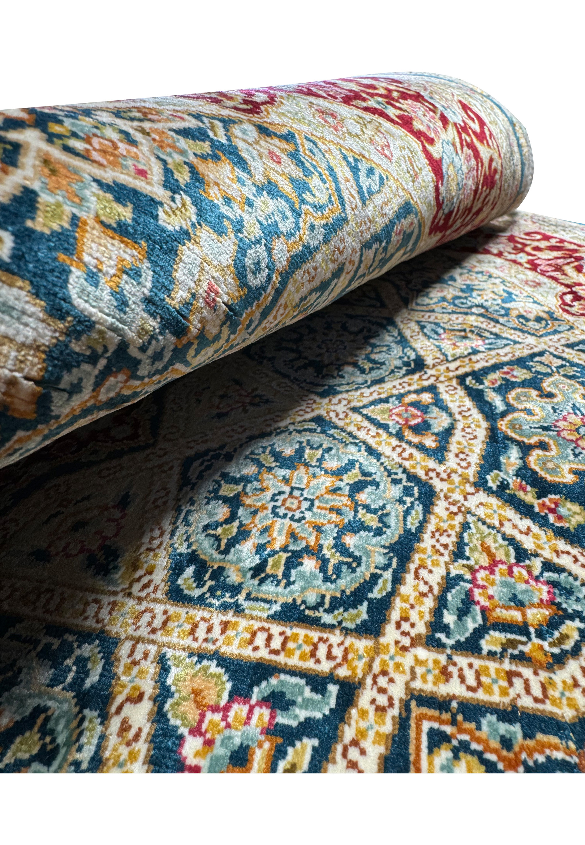 Macro shot of the Persian Qum silk rug texture, showcasing the precision of the weave and the richness of colors