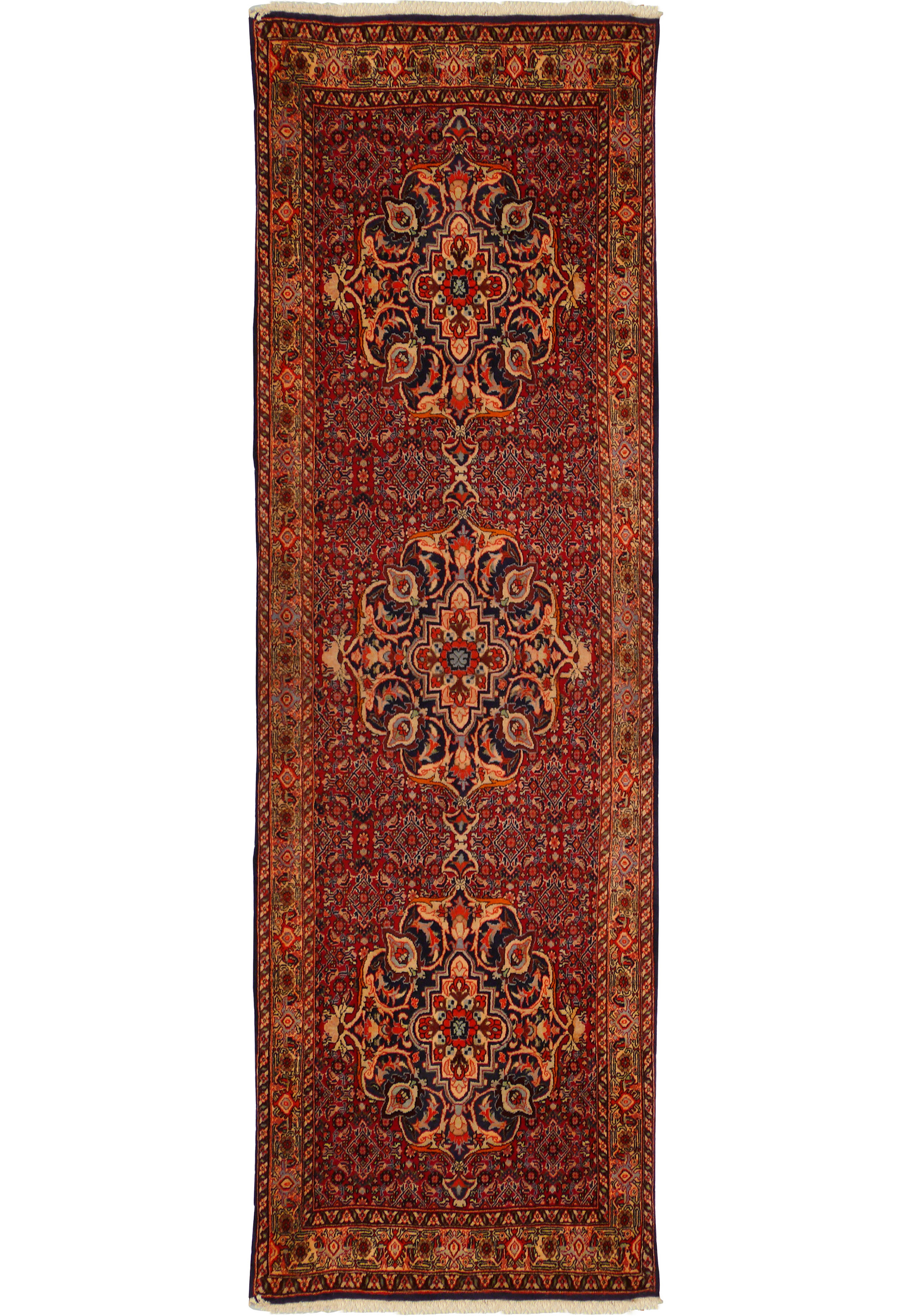 Full-length view of a 3 x 10 Persian Bijar Runner with intricate red, blue, and cream patterns