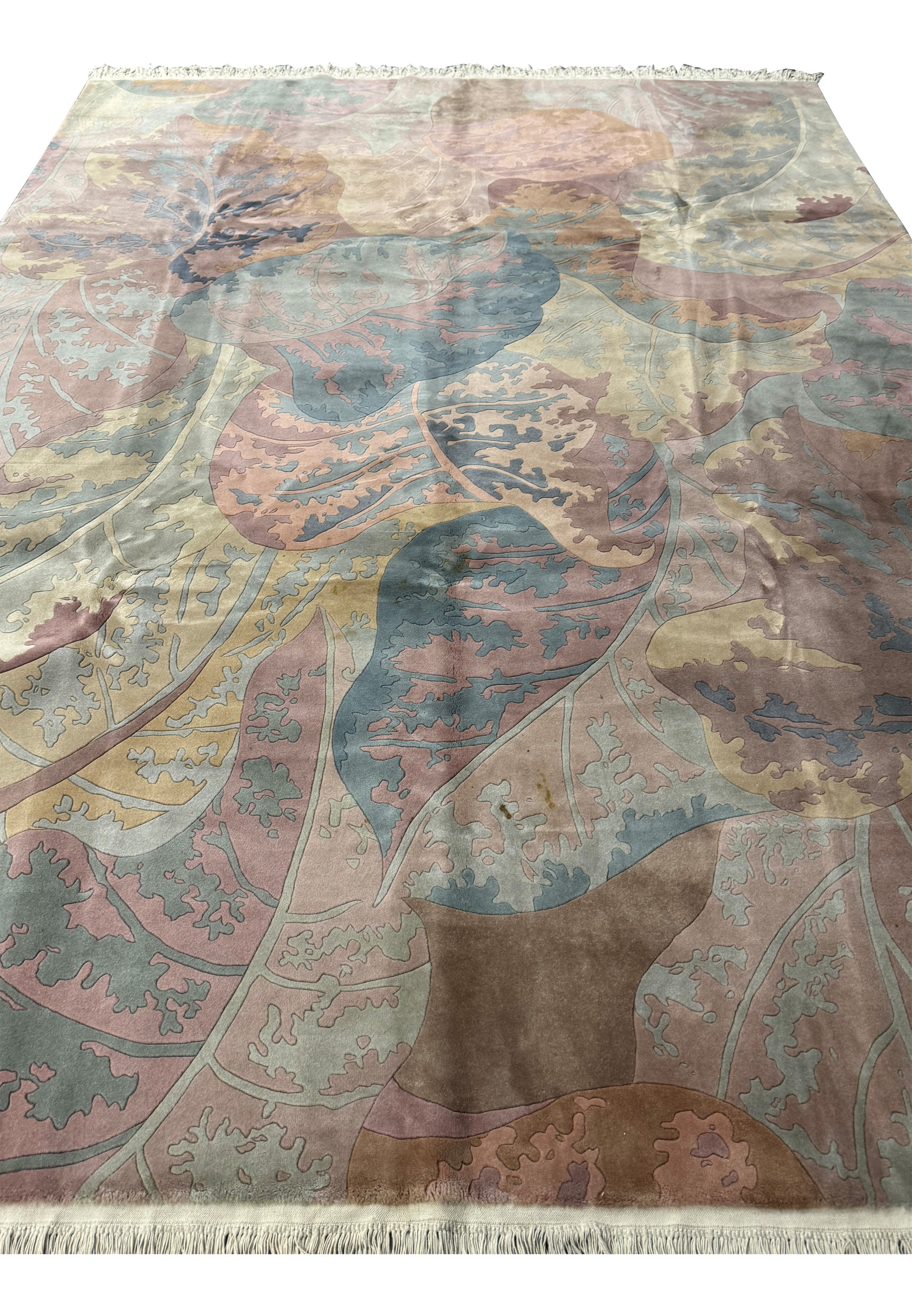 Angled view of a Modern Art Deco Beijing rug, emphasizing the lush pile and depth of the organic leaf design