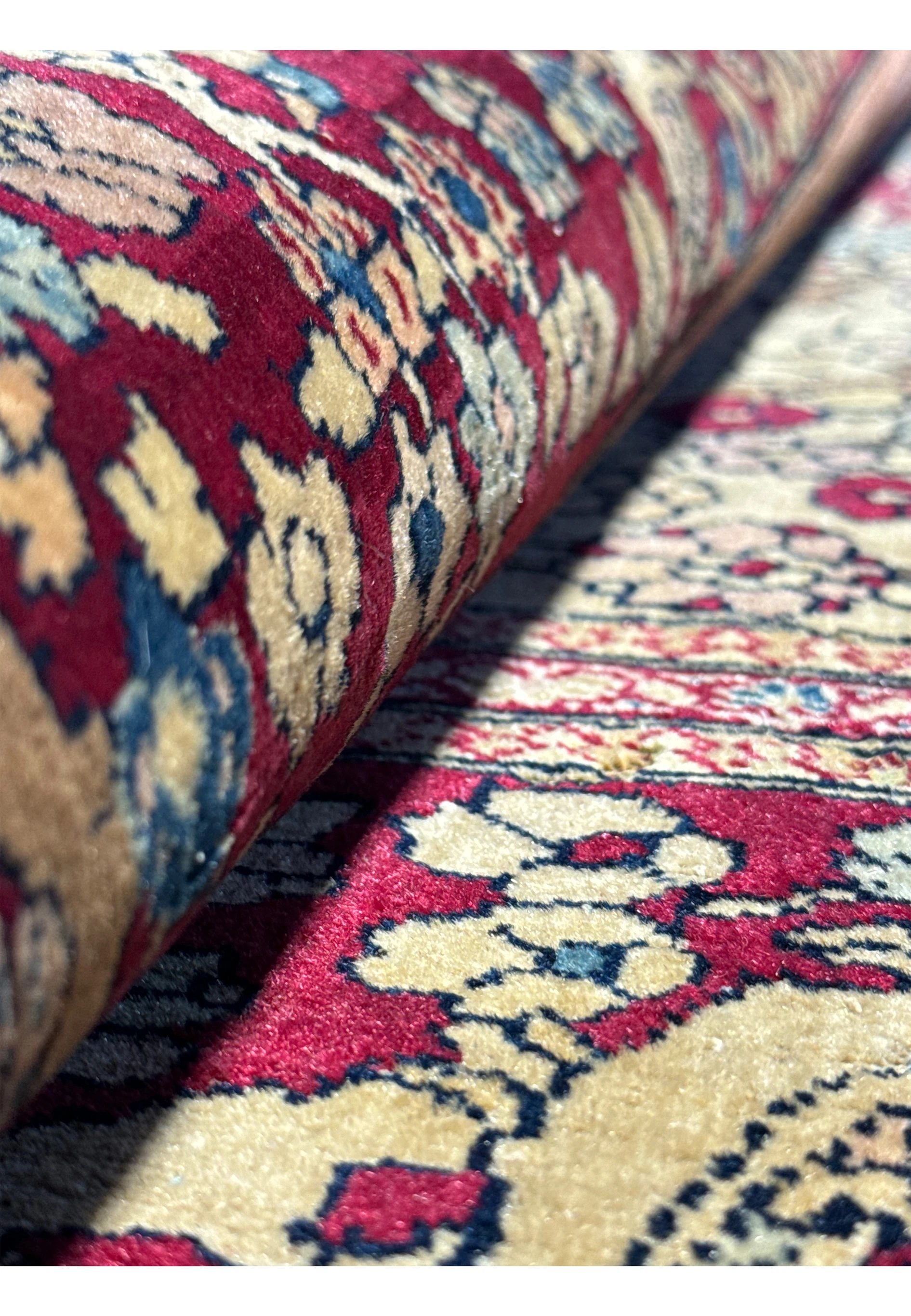 A close-up showing the texture of the weave and the pile of the rug, indicative of its handcrafted quality.