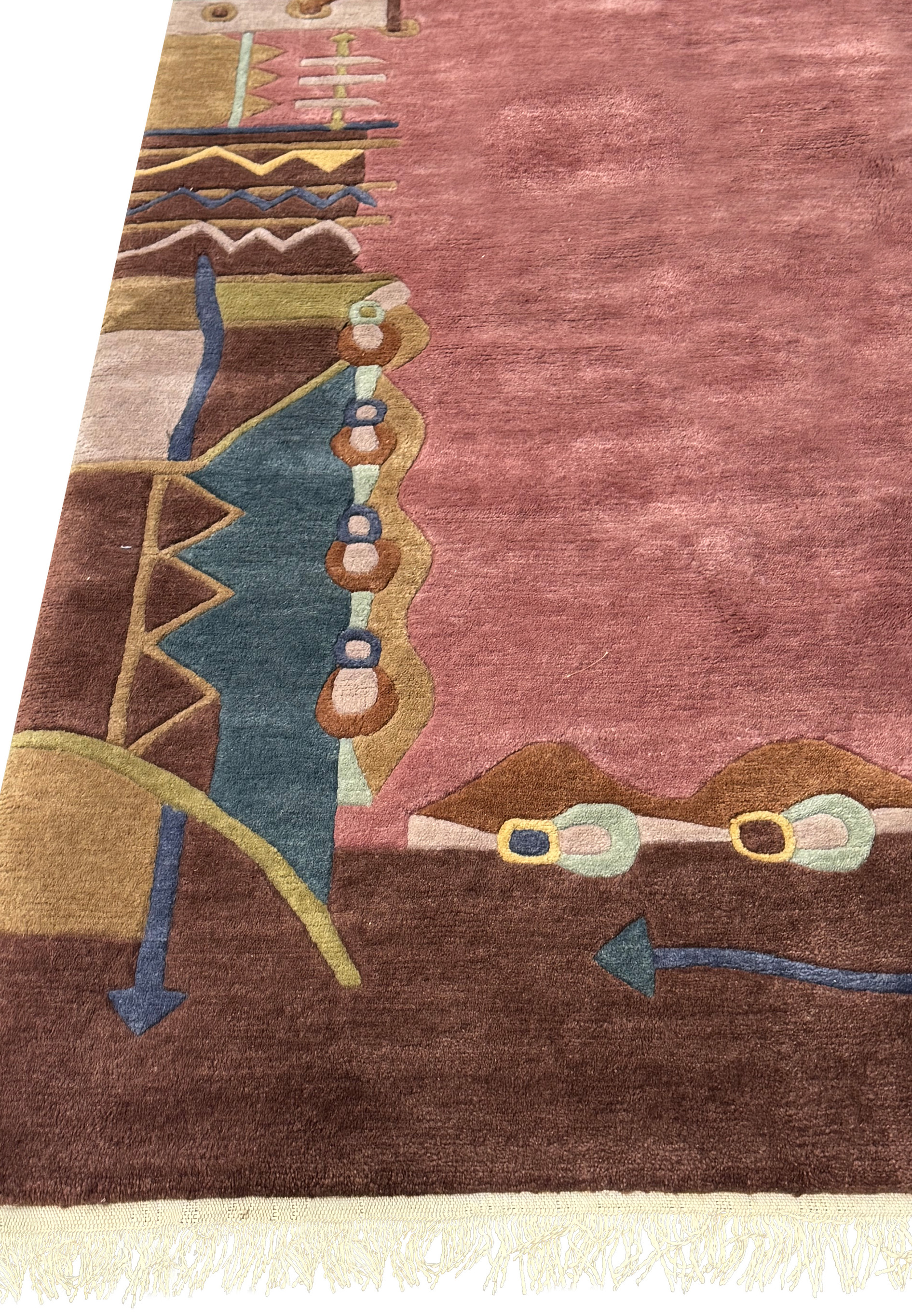 10 x 11'7 modern Tibetan rug with artistic border elements and a soft rose hue