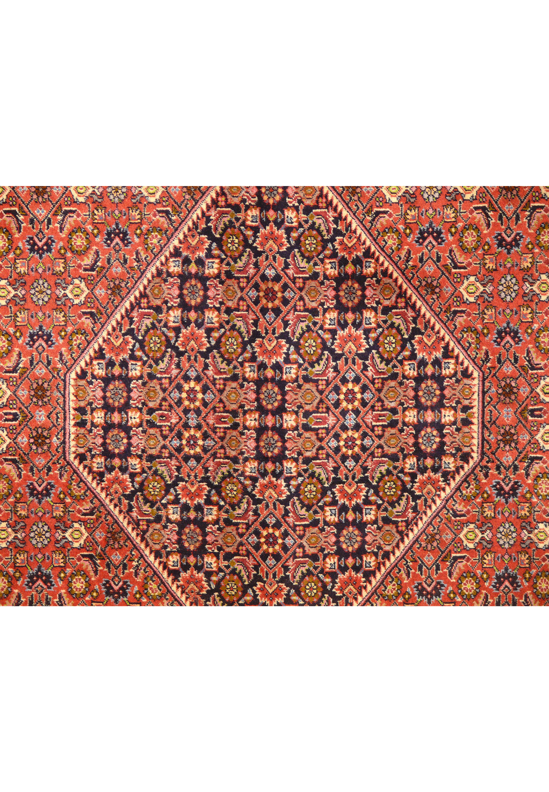 close up of the 8'3 x 11'6 Bijar Persian Rug medallion showing the center colors of it.