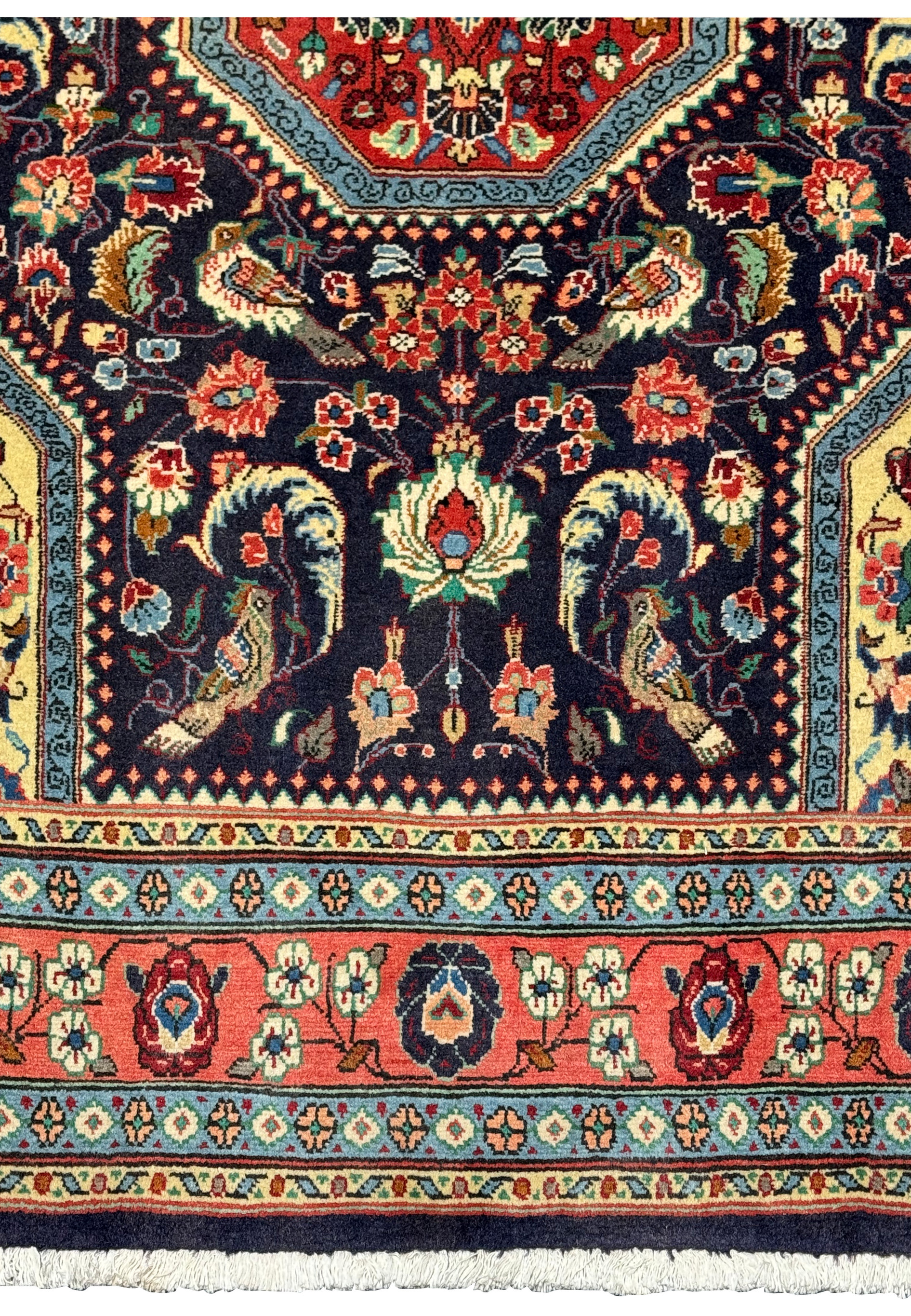 Detailed view of the bottom section of the Persian Bidjar Rug, showcasing the dense weave and intricate floral border designs.