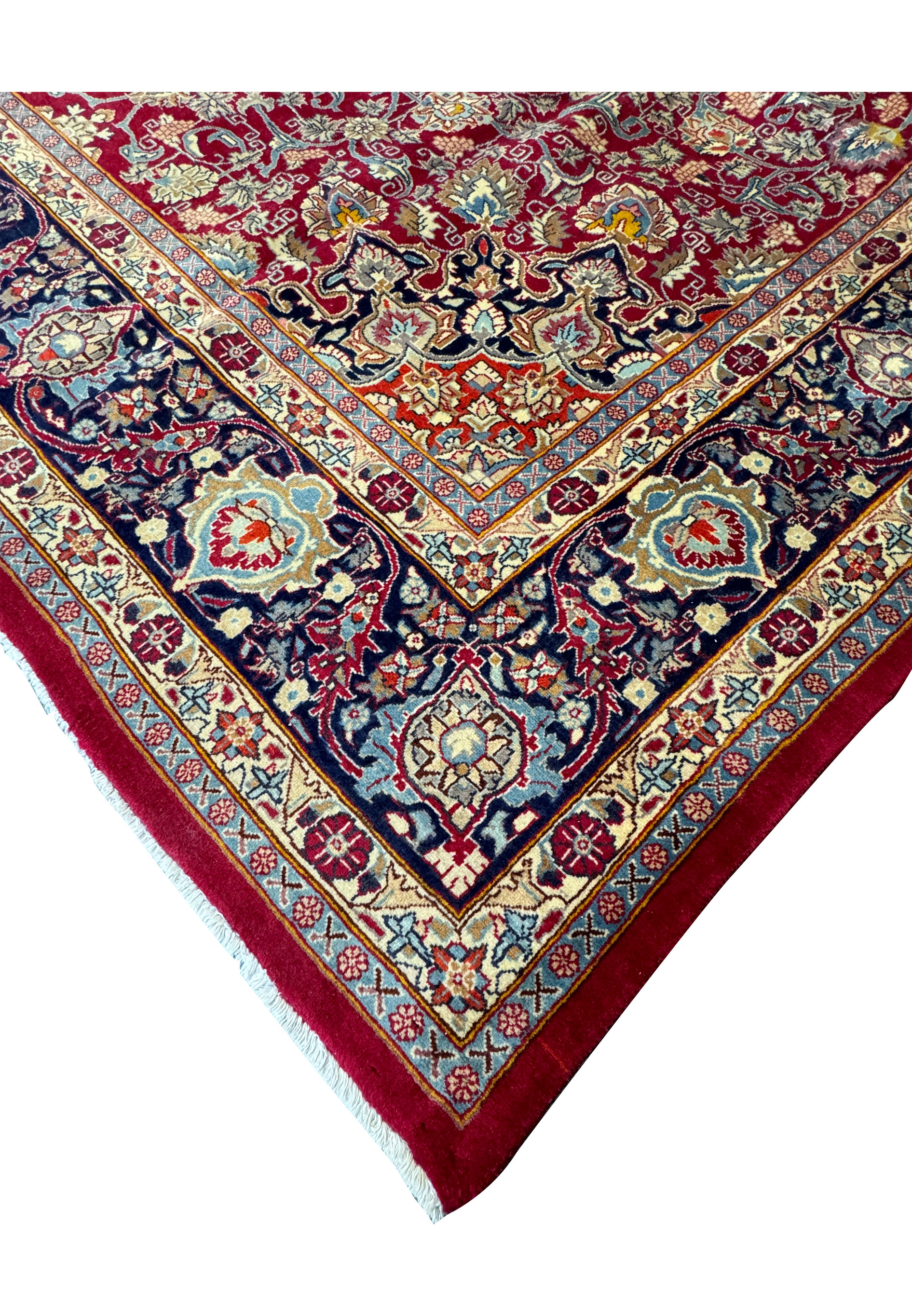 A closer look at the border of the Persian Mahal rug reveals its complex geometric and floral interplay, offering a timeless elegance