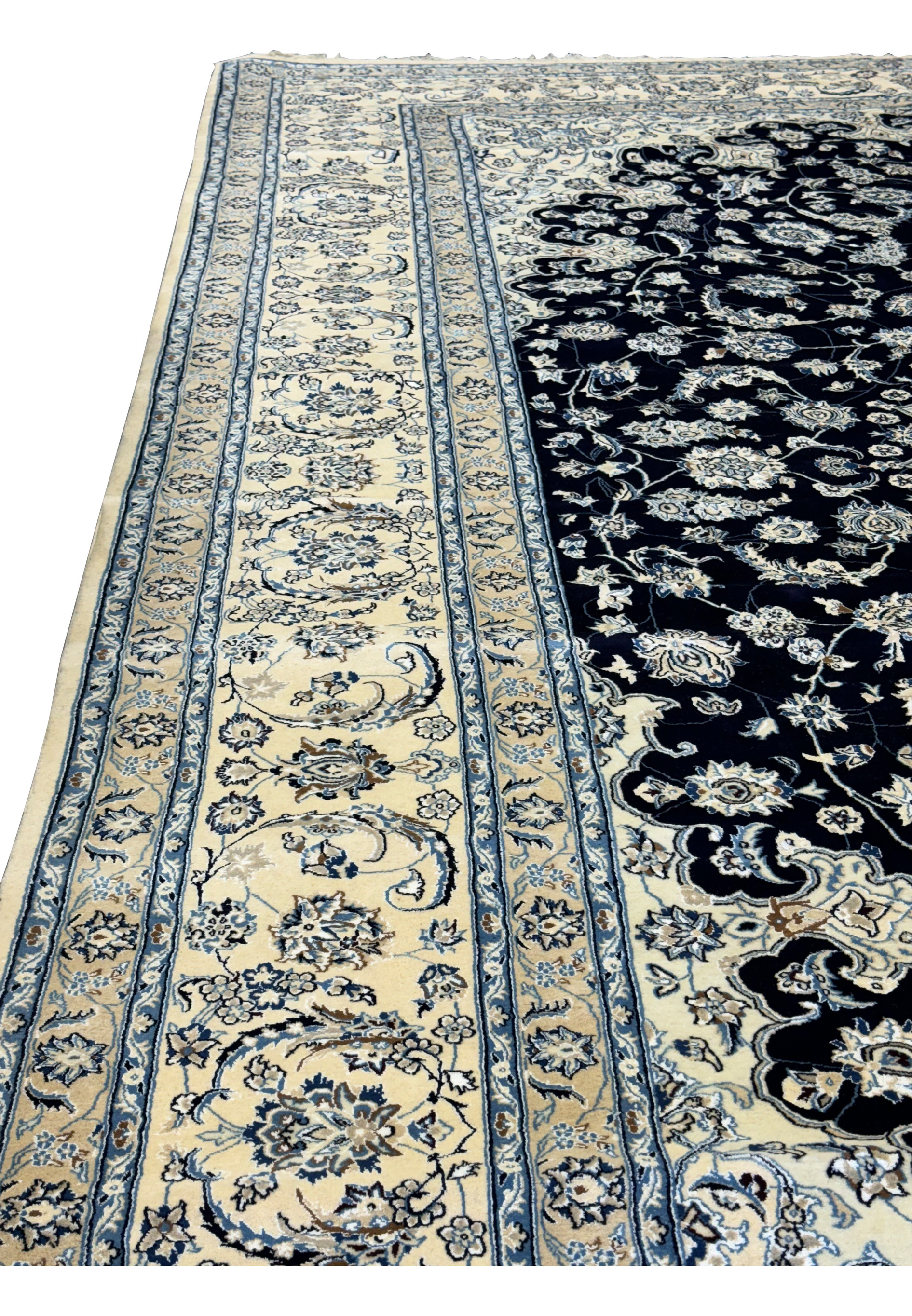 Complete side of the Nain wool and silk 13'2 x 19'4 Persian rug