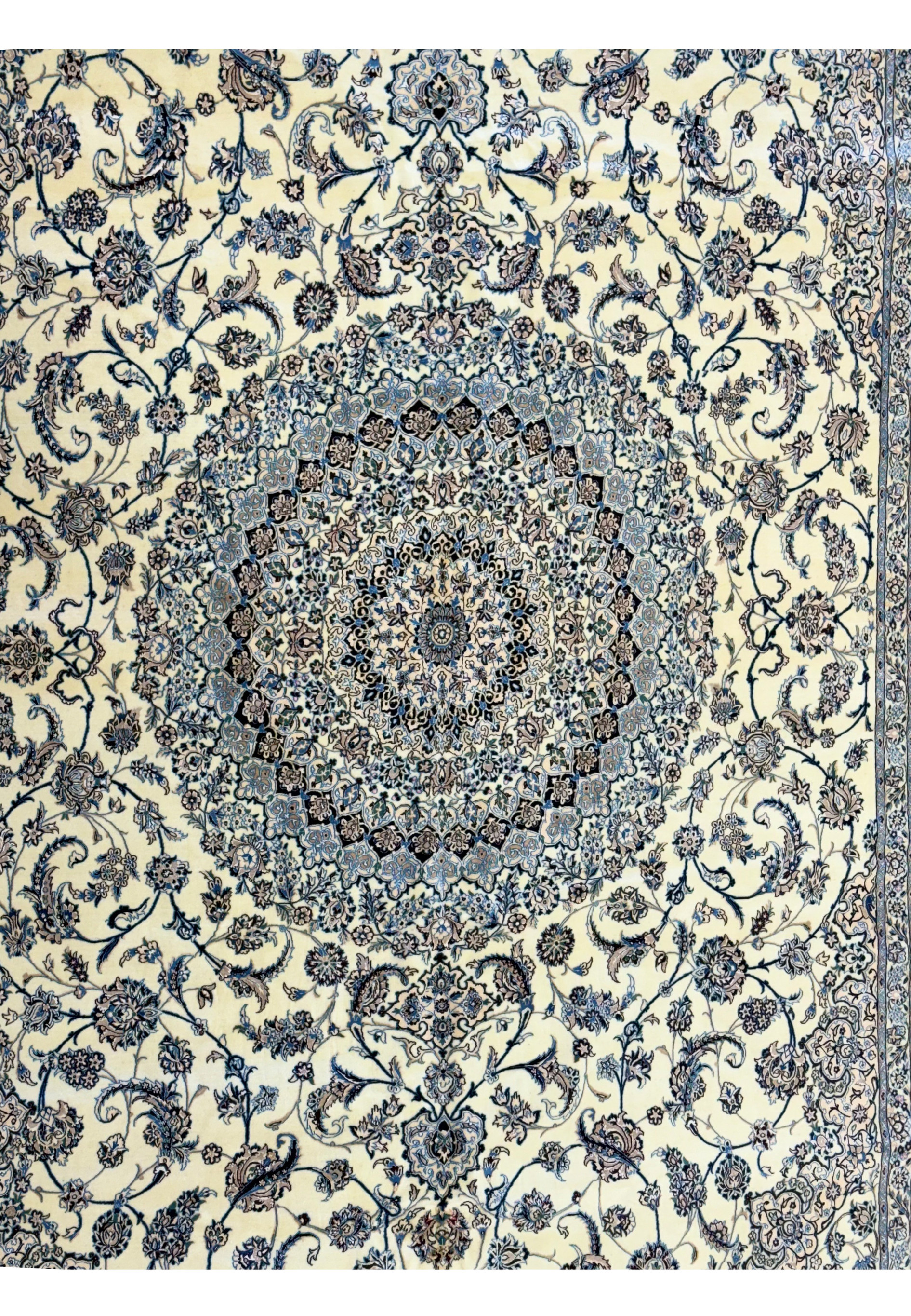 Close-up of the central medallion of a 13 x 20 Persian Nain 9LAA Wool & Silk Rug showcasing fine floral motifs