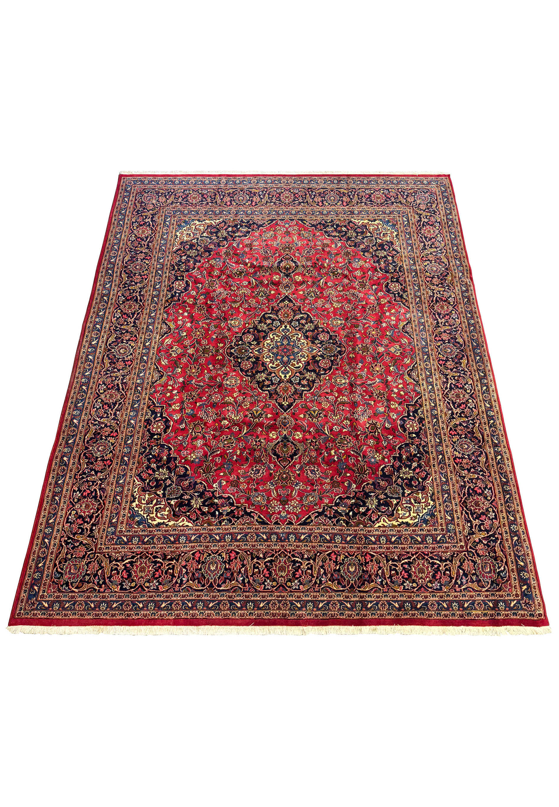 Perspective view of a 9'8 x 13'5 Persian Kashan Rug showing detailed patterns and vibrant colors.