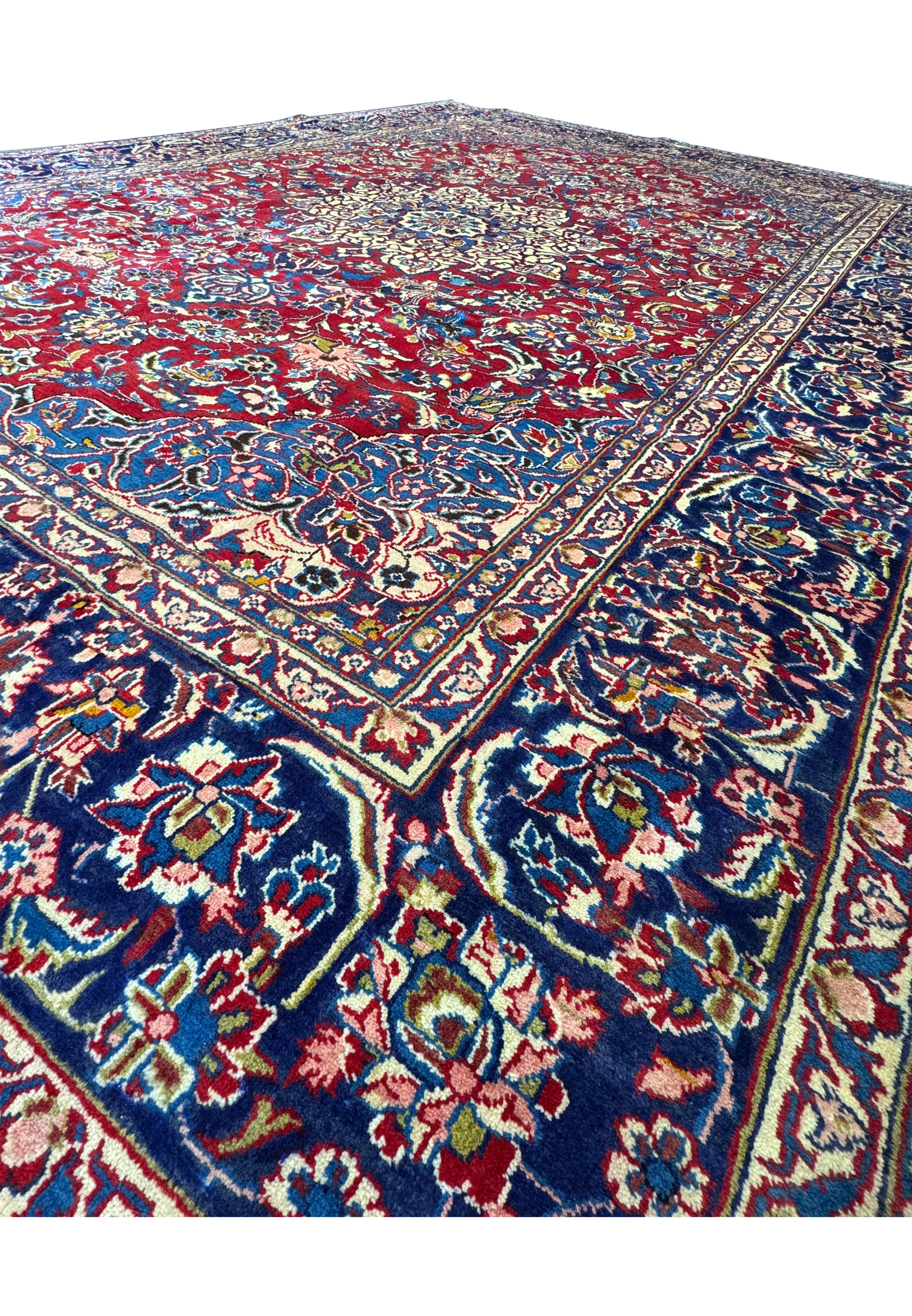 Side view showcasing the plush wool pile of the 9'11 x 12'11 Persian Isfahan Rug.