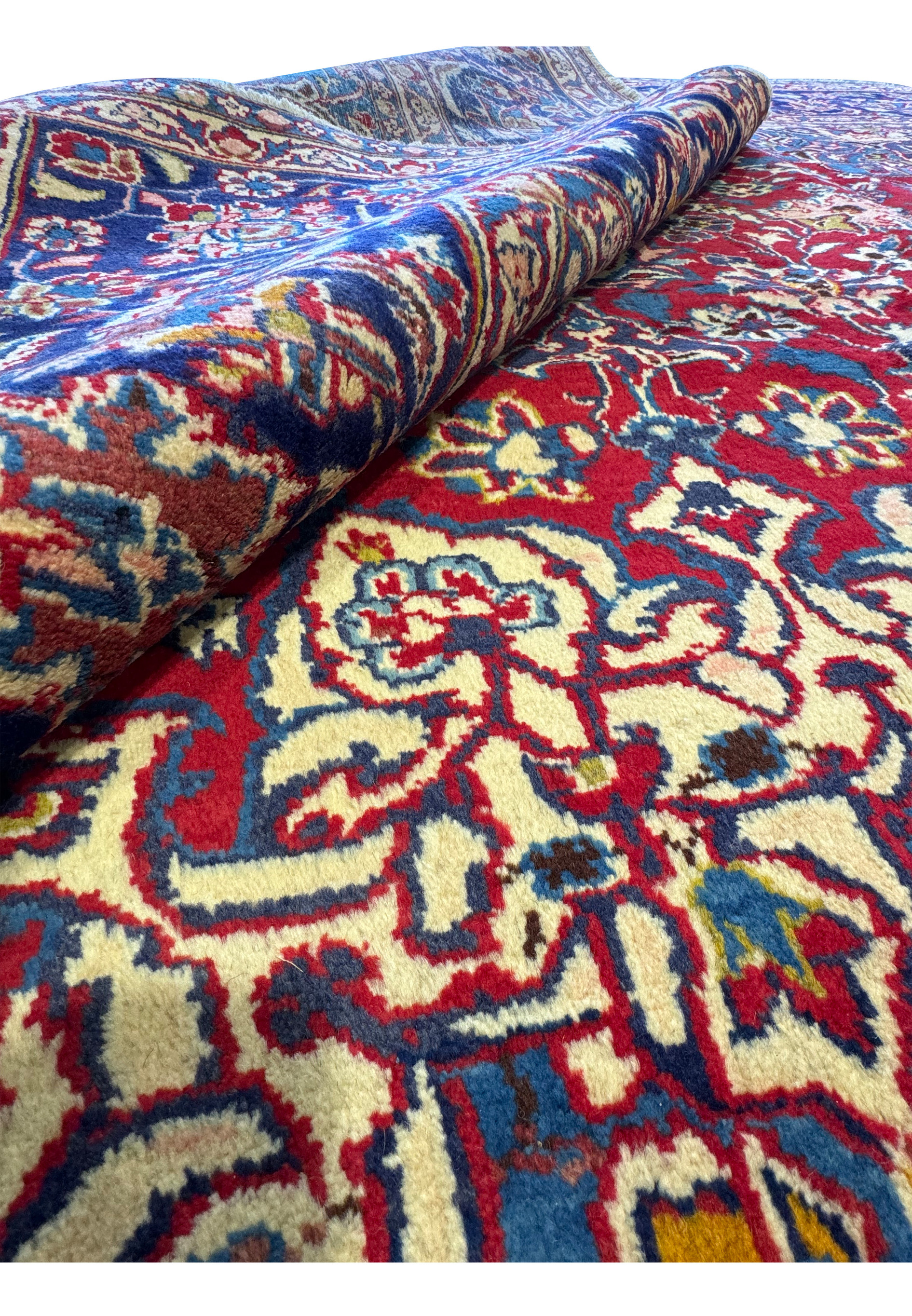 Close-up of the floral and vine motifs on the Persian Isfahan Rug.