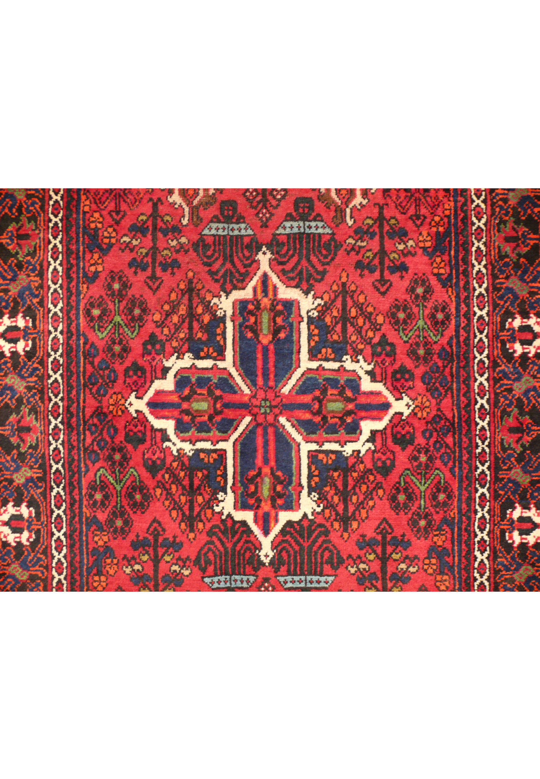 A horizontal view of the central section of the Persian Meymeh runner rug, highlighting the detailed medallion and surrounding patterns. The rich colors and high-quality wool fibers are clearly visible.
