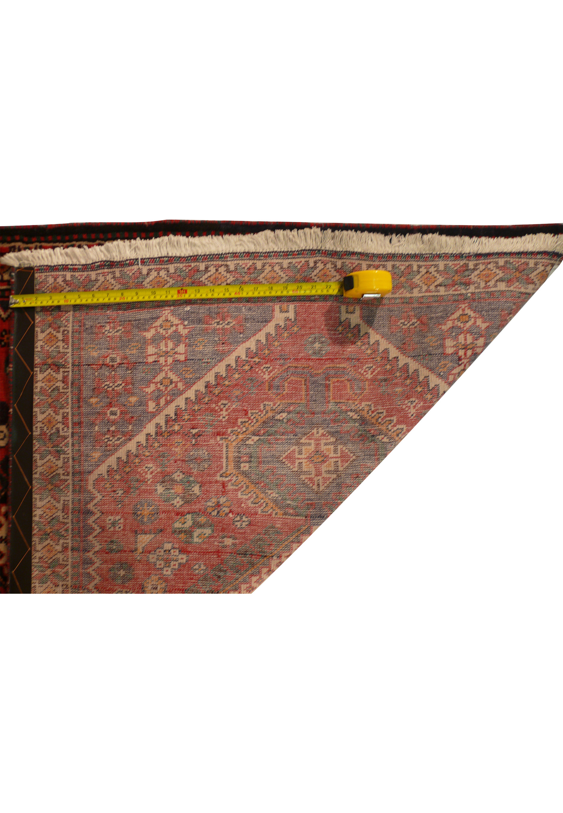 Another view of the Persian Bakhtiar runner rug, focusing on the intricate border and the fine detailing of the geometric and floral patterns. The combination of red, orange, ivory, black, and green colors enhances the rug's aesthetic appeal.