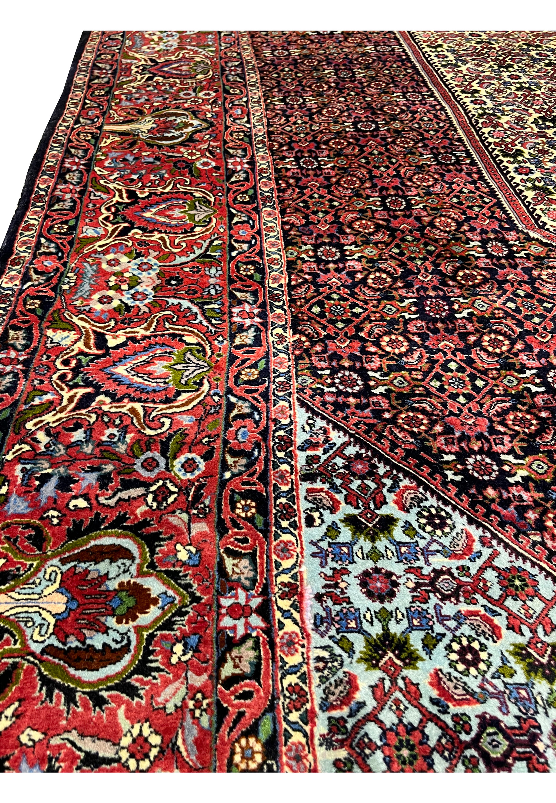 Side angle view of a 9.8 x 12.2 Persian Bijar rug showing thick pile height, compact knot density, and the sturdy structure associated with classic iron rugs.