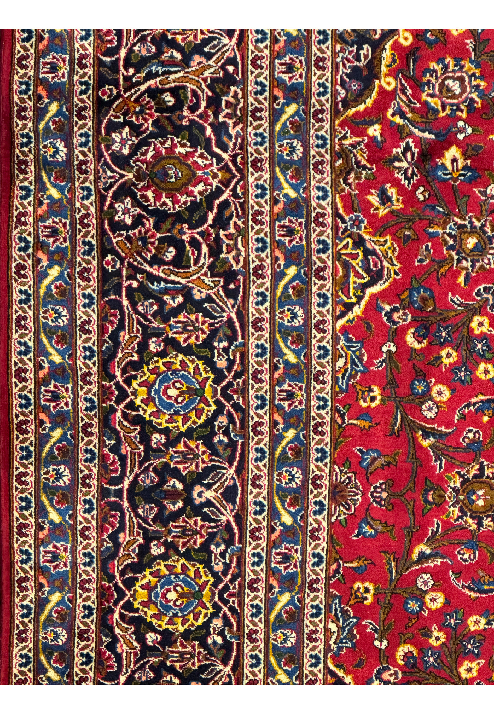 Side view of the Persian Kashan Rug emphasizing the intricate border design and vibrant colors.