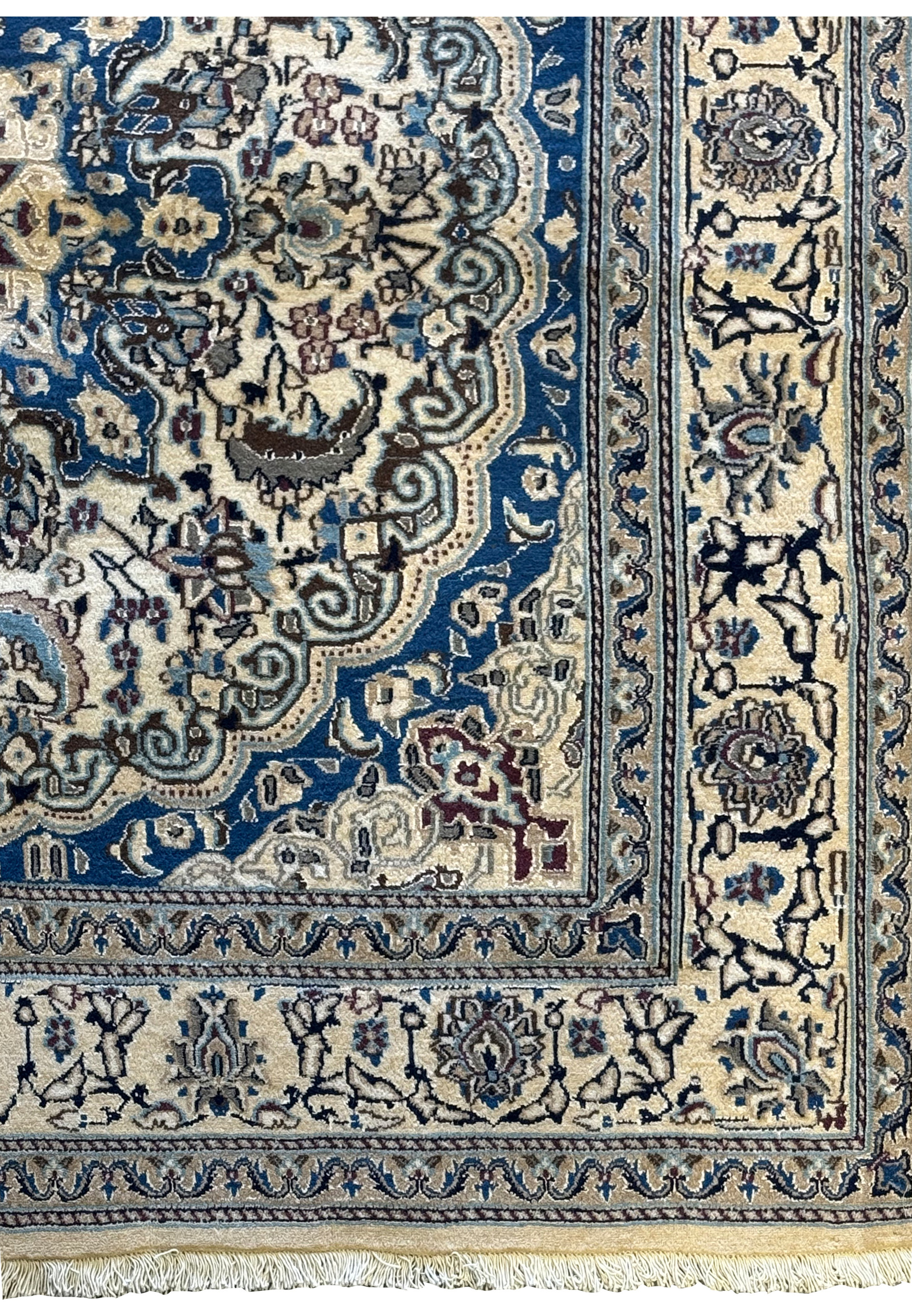 Side view of the Persian Nain Square Rug, showing the detailed craftsmanship and fringe.