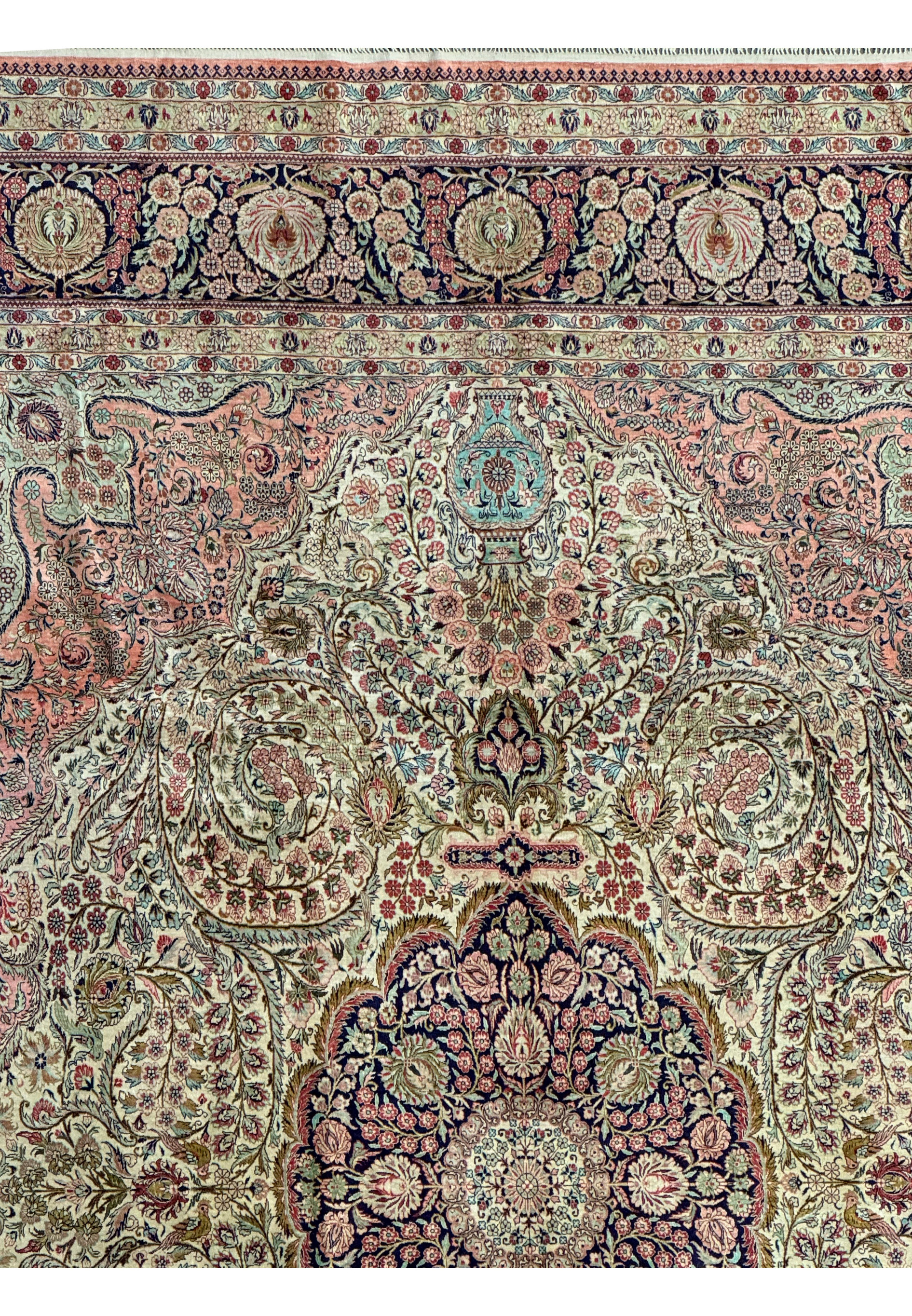 Close-up of floral patterns on a 8x10 Persian Tabriz 100% silk rug