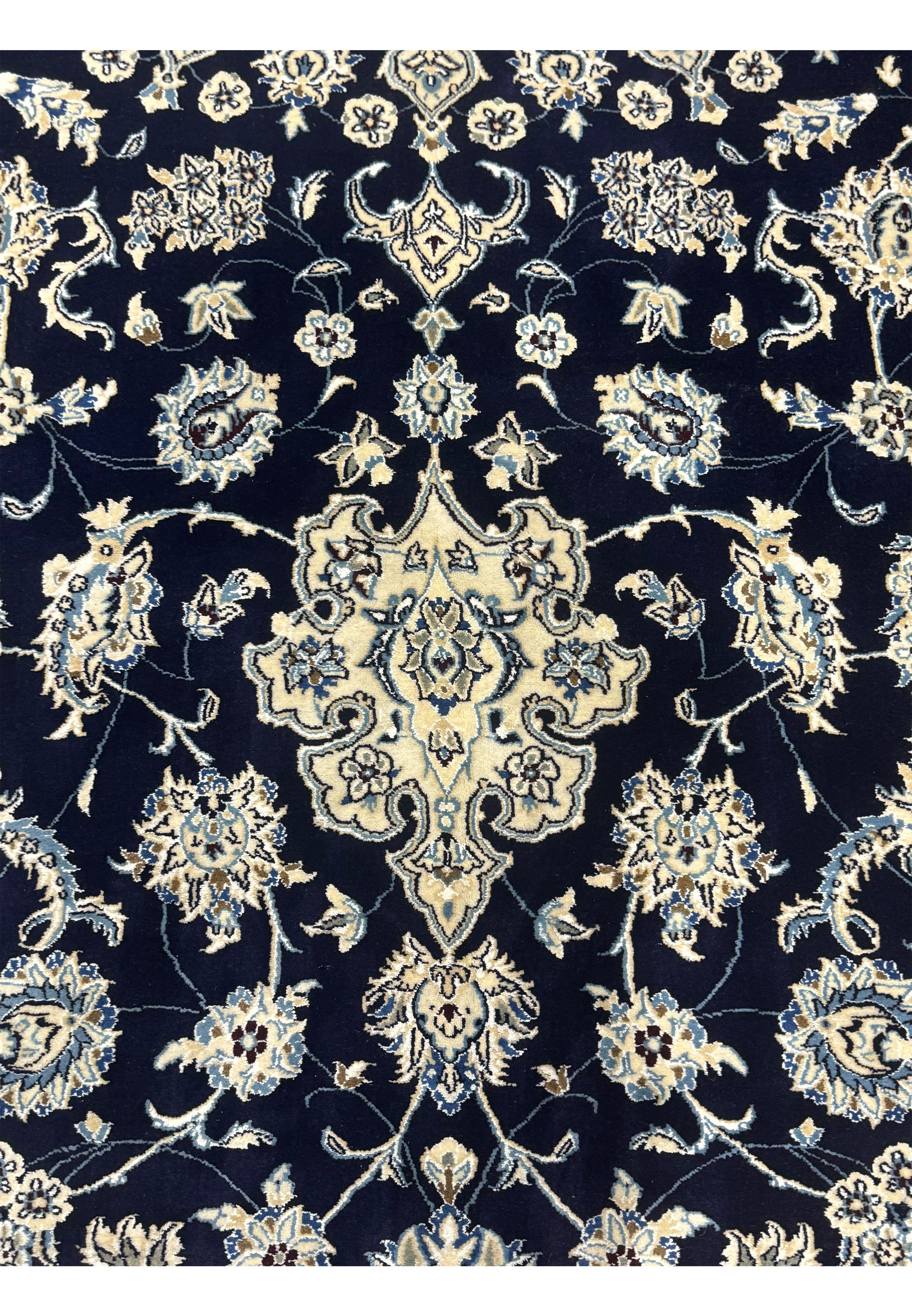 Close-up of detailed motifs on the 13 x 19'8 Persian Nain Rug, showcasing craftsmanship.