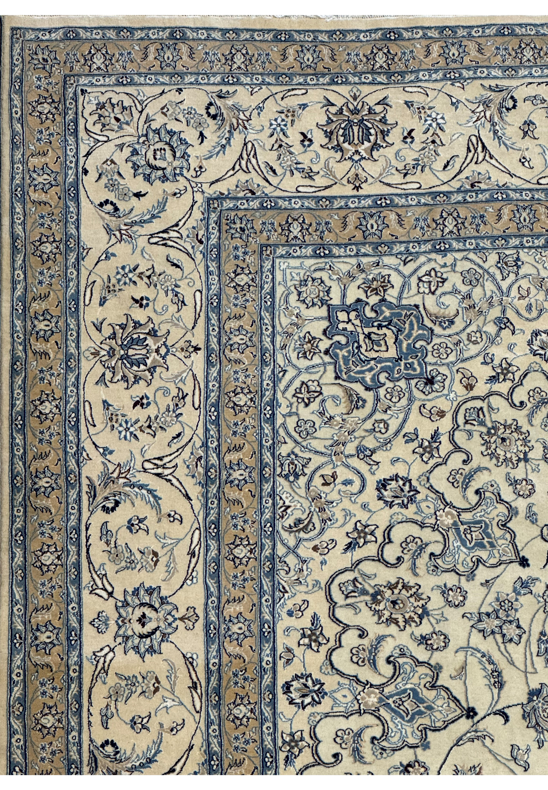 Luxurious texture and sheen of the wool and silk blend in a Persian Nain 9LA Rug